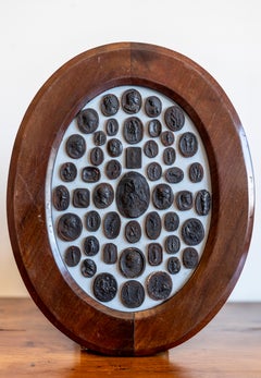 Pair of Italian 19th Century Black and White Intaglios in Oval Wooden Frames