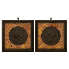 pair of Italian 19th century Bronze and Marble plaques of Mars and Minerva