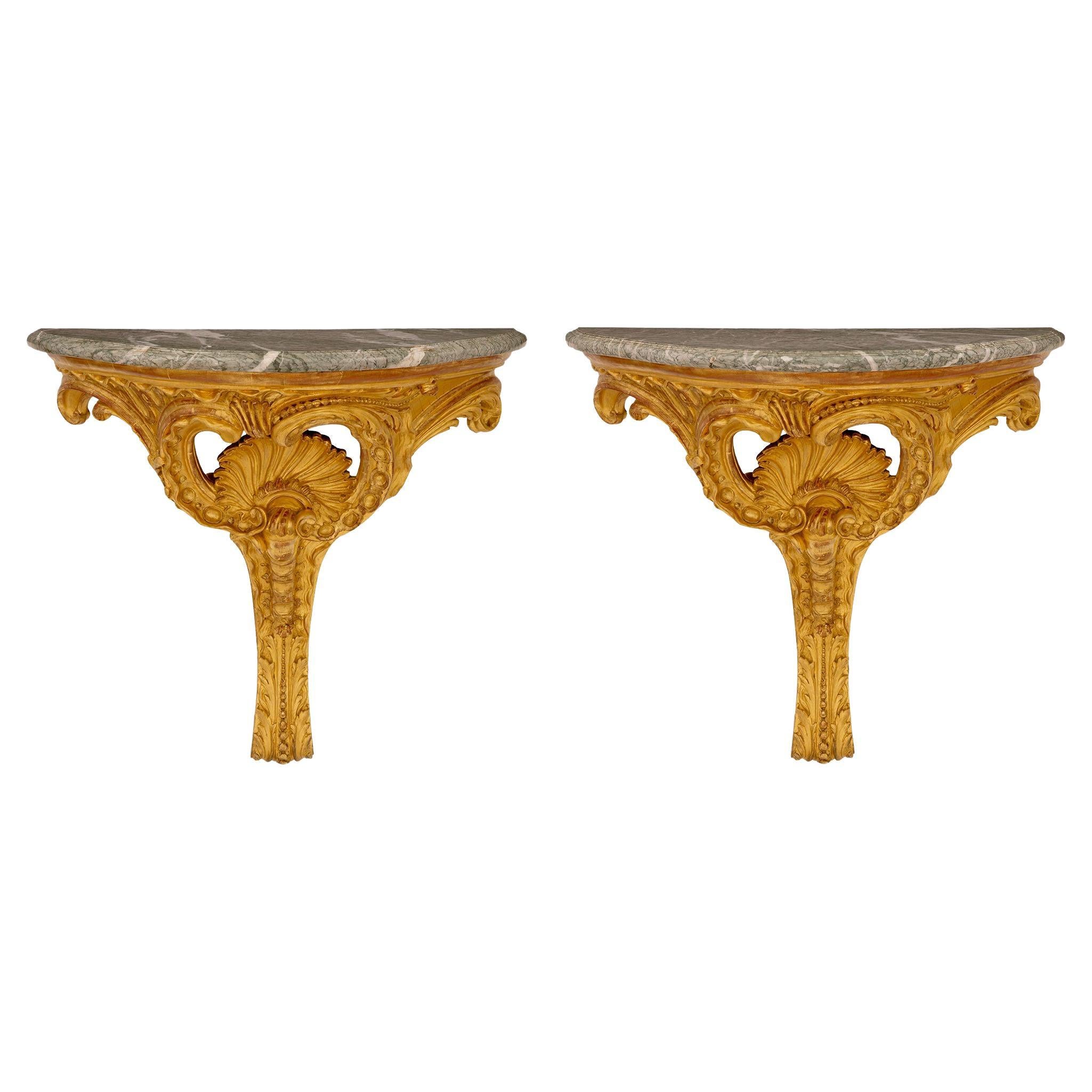 Paire de consoles italiennes du 19ème siècle en bois doré et marbre de style Louis XV