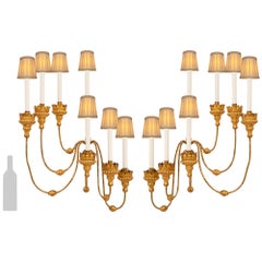 pair of Italian 19th century Louis XVI st. Gilt Metal and Giltwood sconces