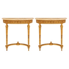 Pair of Italian 19th Century Louis XVI St. Giltwood and Marble Consoles