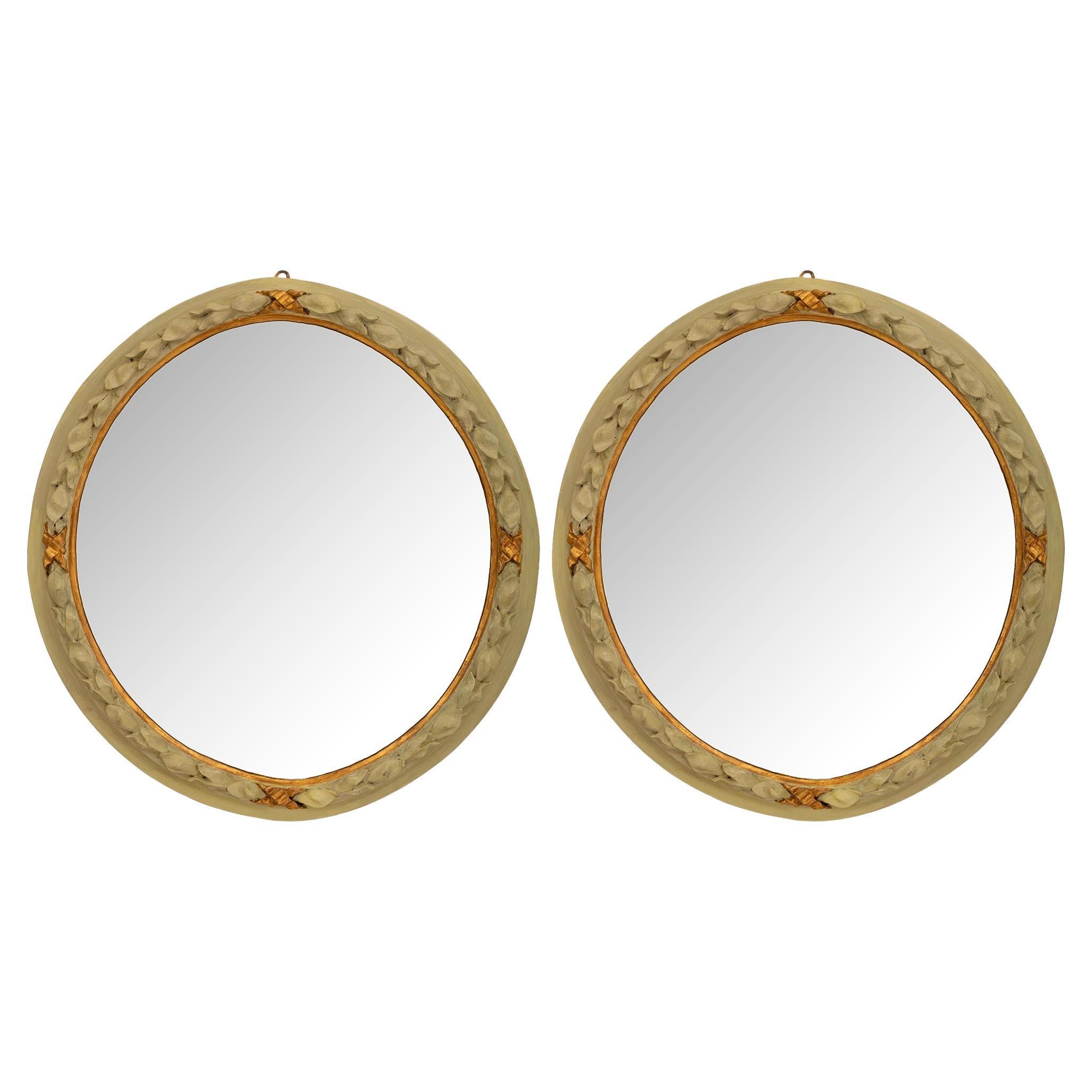 Pair of Italian 19th century Louis XVI st. Giltwood and patinated Wood mirrors