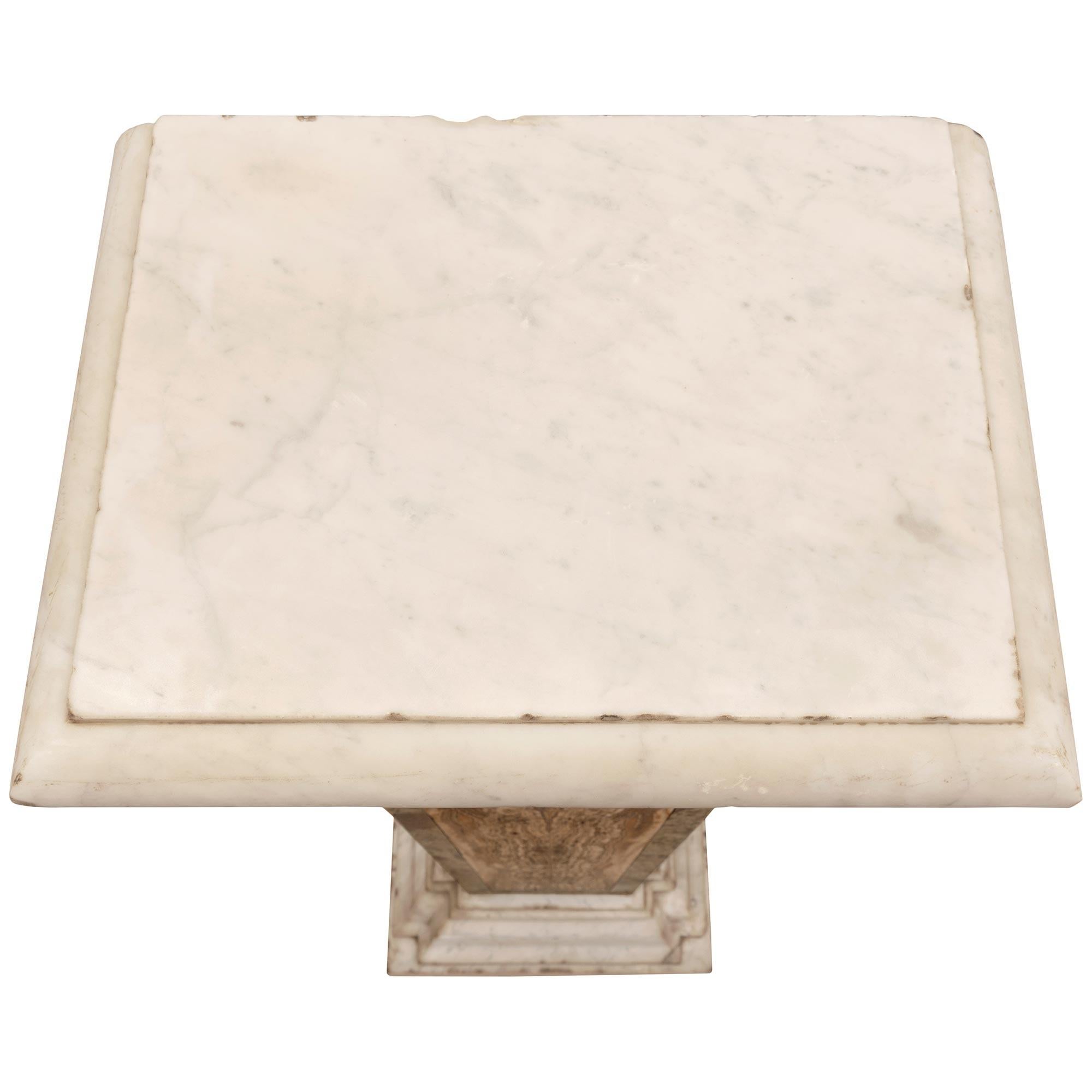 A stunning and most impressive pair of Italian 19th century Neo-Classical st. Alabastro Fiorito, Verde Antico and white Carrara marble pedestal columns. Each pedestal is raised by an elegant white Carrara marble base with fine mottled and stepped