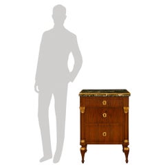 pair of Italian 19th century Neo-Classical Walnut, Giltwood and marble chests