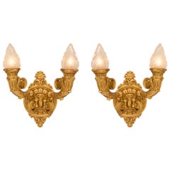 Paire d'appliques néoclassiques italiennes Bras de Lumière du 19ème siècle en bois doré