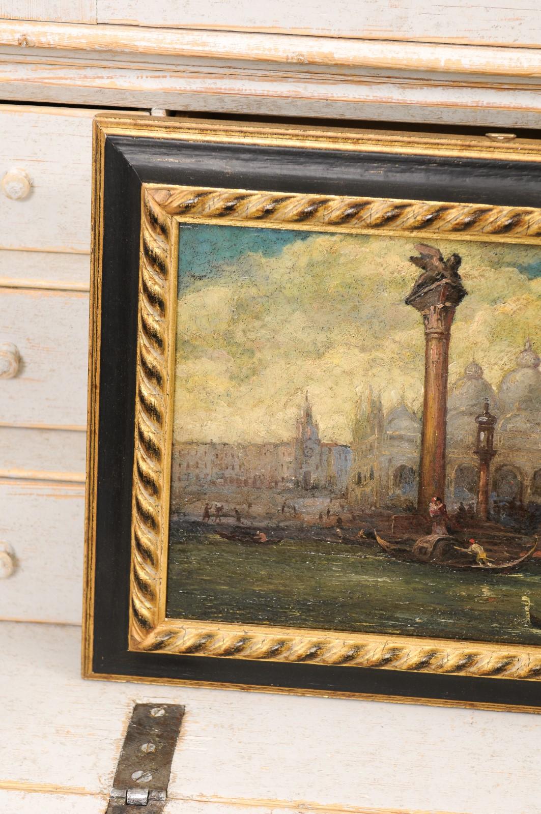 Paire de peintures italiennes du 19ème siècle représentant Venise dans des cadres noirs et or en vente 2