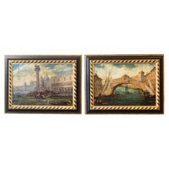 Coppia di quadri italiani del XIX secolo raffiguranti Venezia in cornici nere e dorate