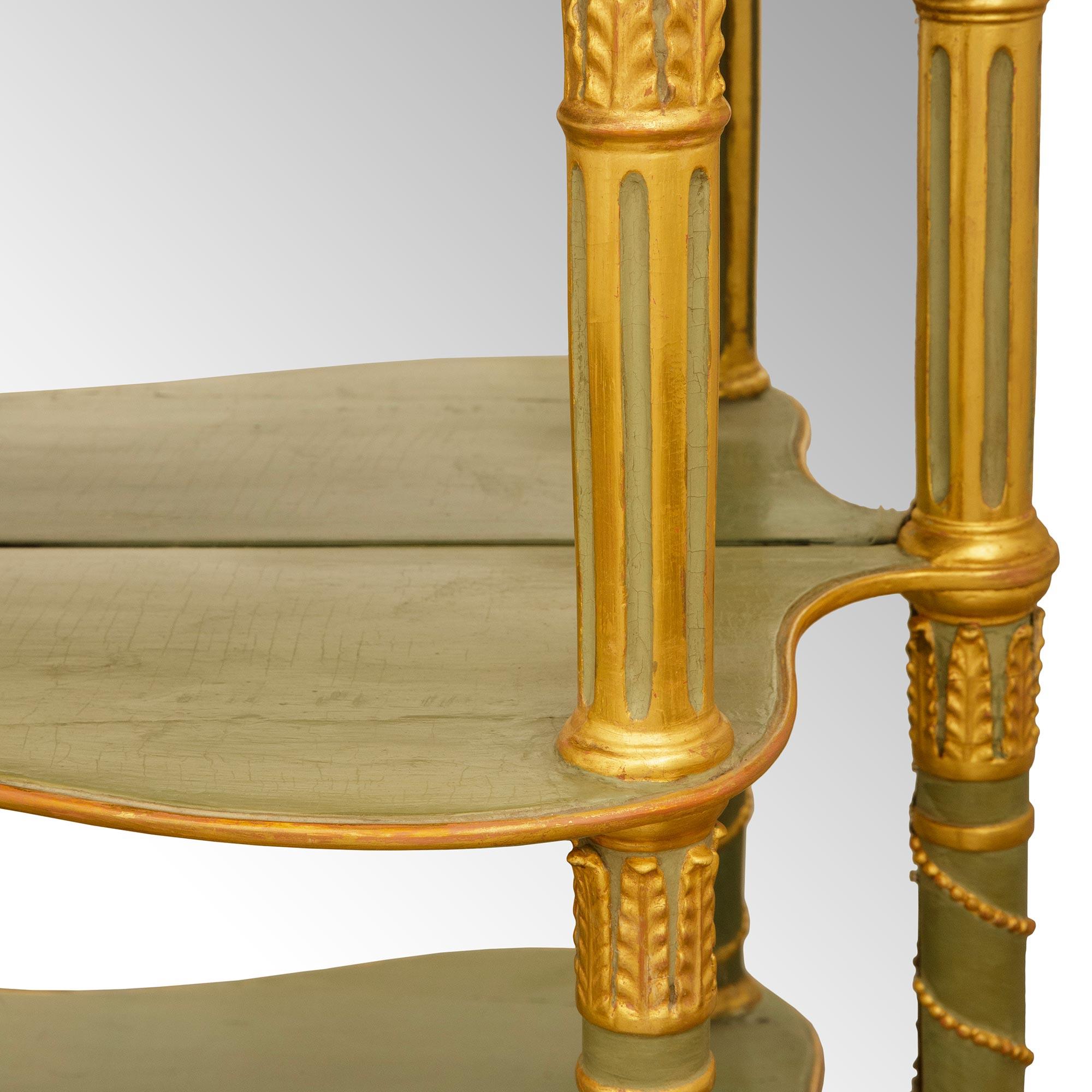 Miroir pair of Italian 19th century patinated wood, Giltwood, and marble consoles en vente
