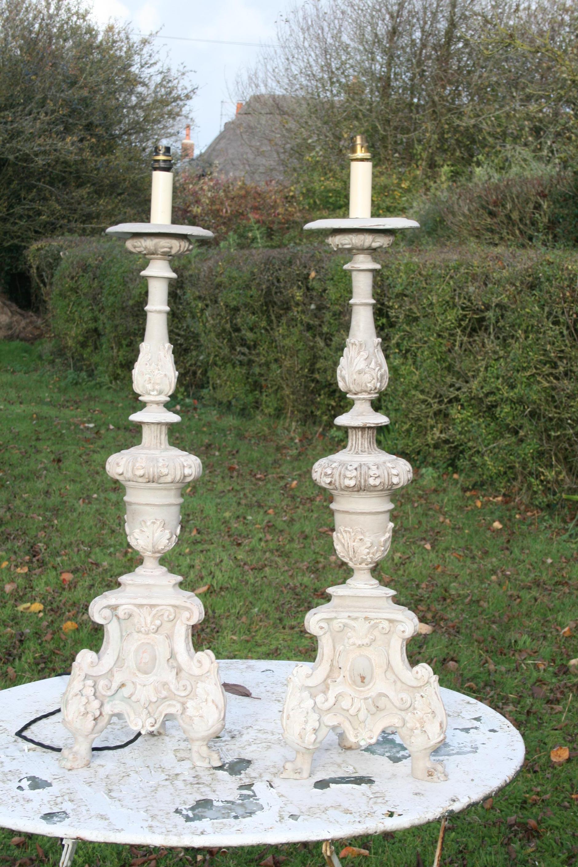 Pair of 19th century large candlesticks or pricketts, in carved wood with crackle finish paint, working order.