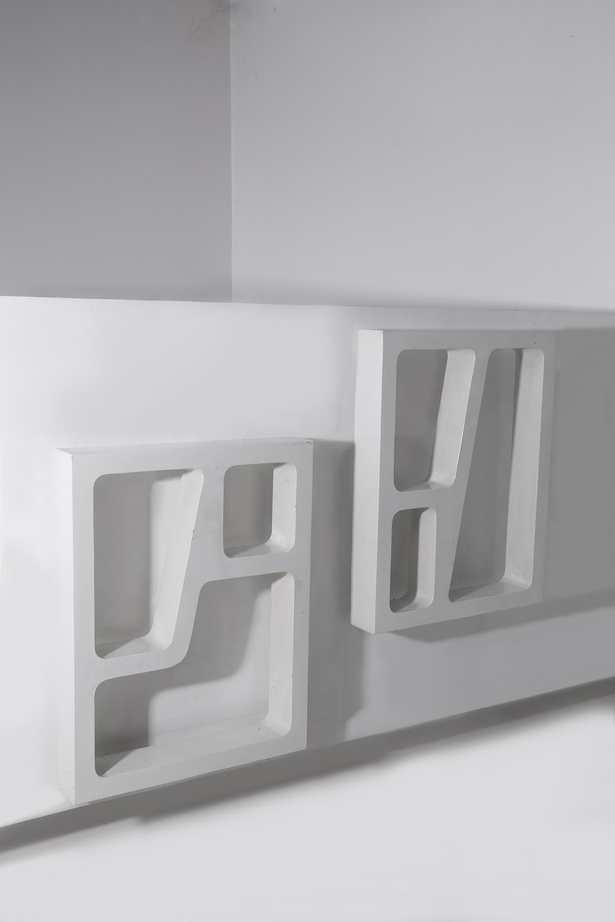 Metal Pair of Italian anthropomorphic hanging bookcases in the style of Gio Ponti For Sale