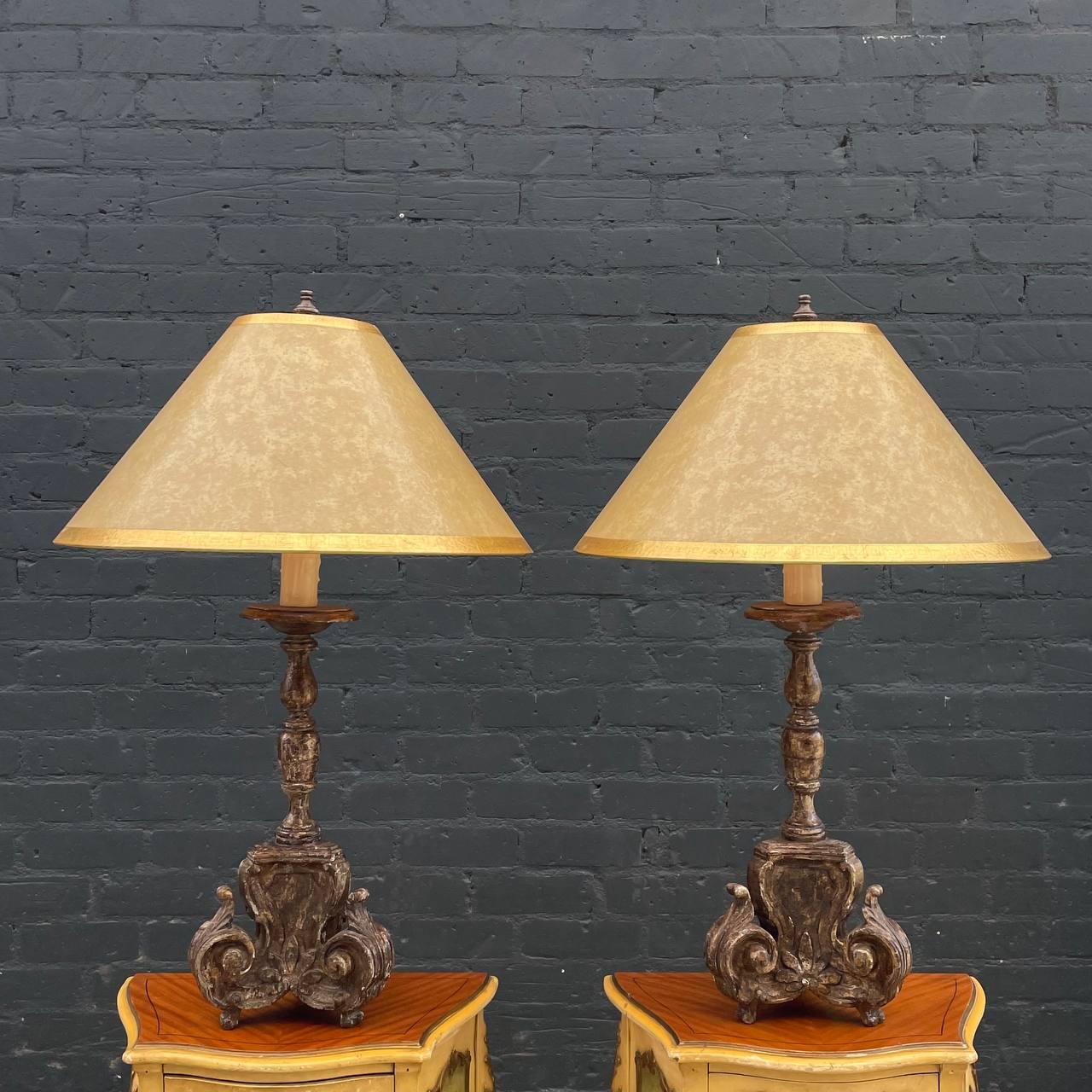 Pair of Italian Antique Candlestick Style Table Lamps with a Distressed Paint Finish 

Country: Italy
Materials: Distressed Wood, Original Shade
Style: Italian Antique 
Year: 1940’s

$2,200 pair 

Dimensions:
37”H x 10.50”W x