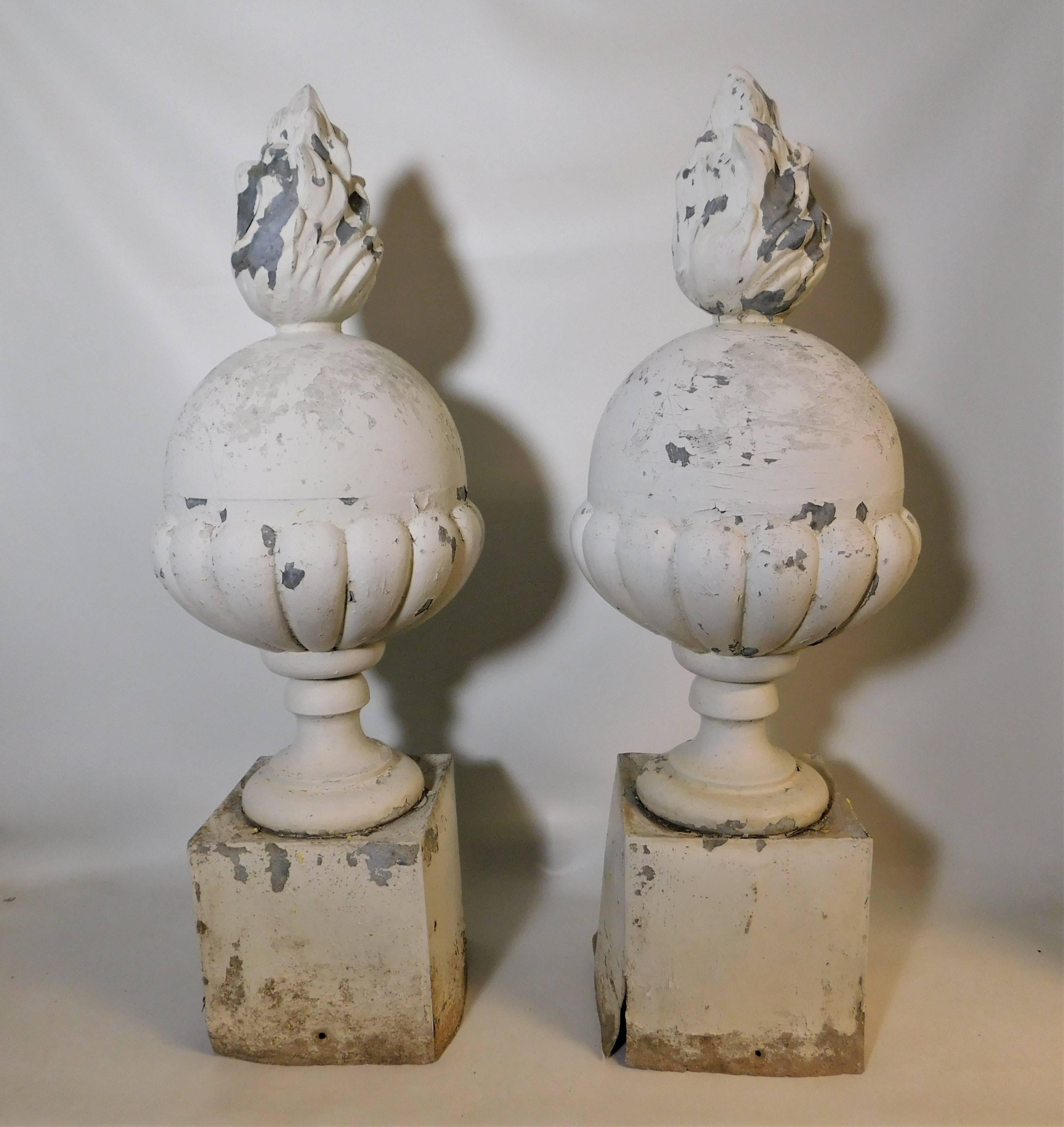 These late 19th century Italian architecturally ornate flame finials are made of zinc coated sheet metal. They were used on a roof or can be used as a landscaping element.