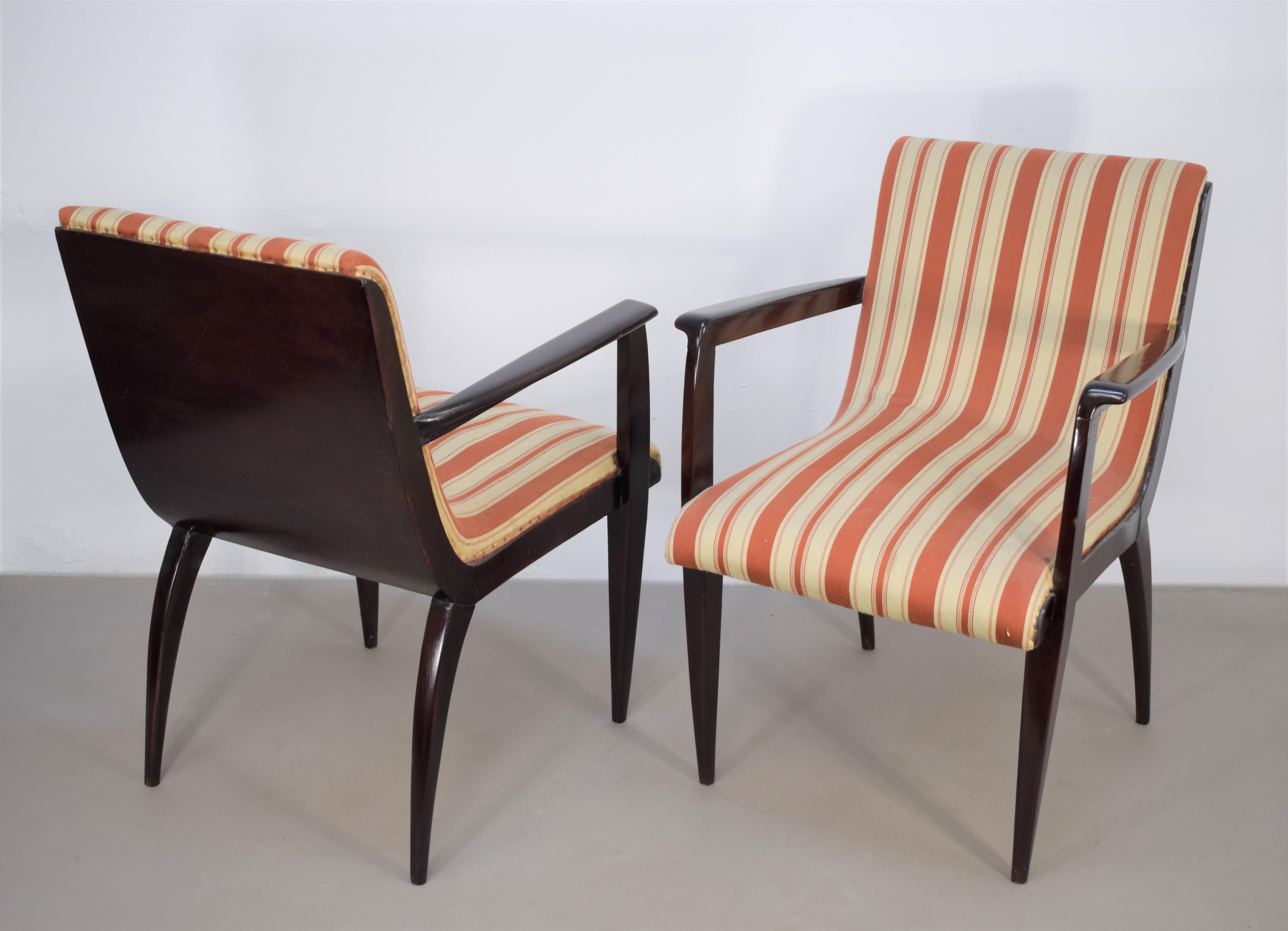 Pair of Italian armchairs attributed to Guglielmo Ulrich, 1950s.

Dimensions: H= 81 cm; W= 64 cm; D= 59 cm; H seat= 42 cm.
