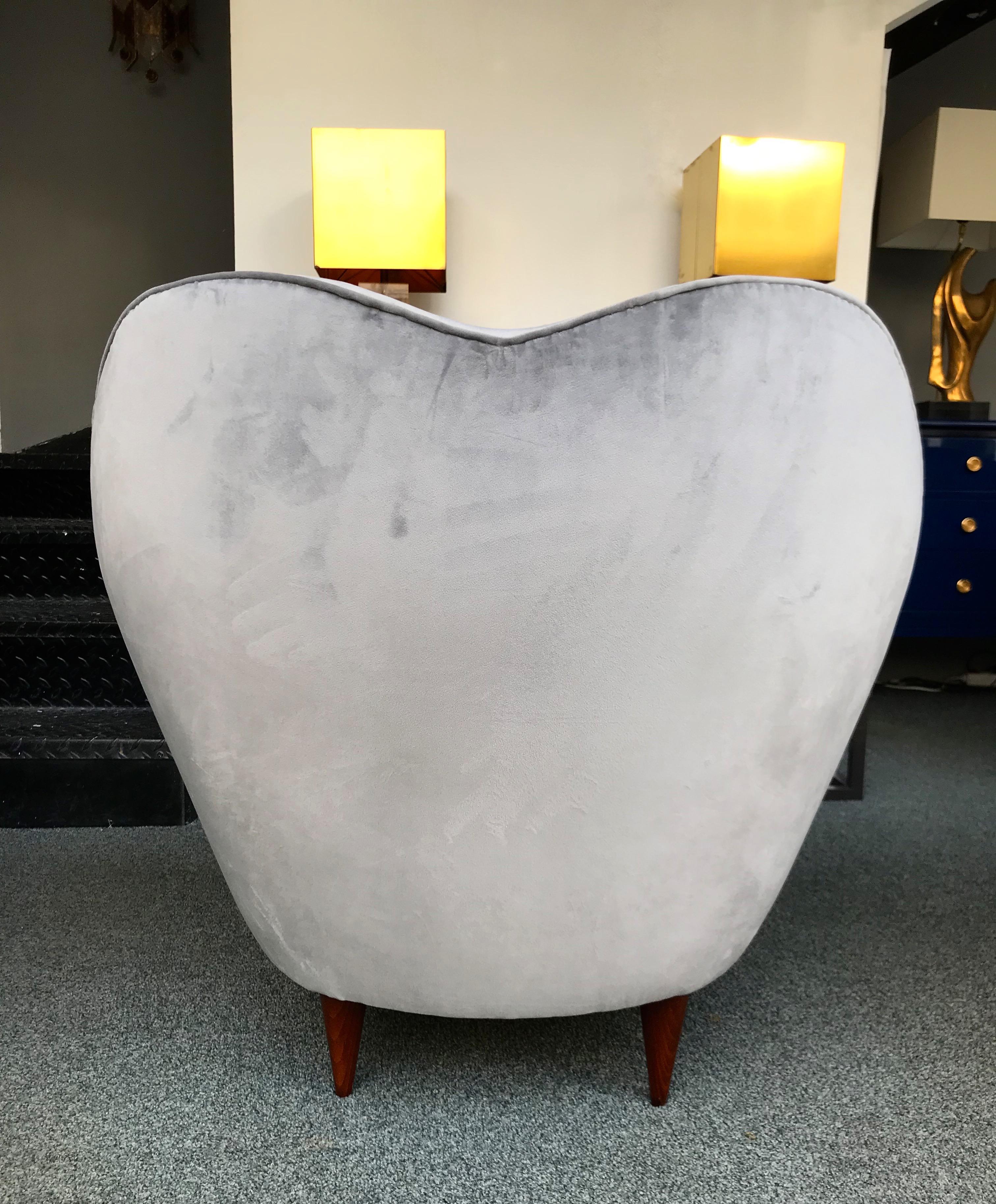 Pair of armchairs or lounge chairs by the designer Federico Munari, fully upholstered with a smoke light grey velvet fabric, wood feet replace. Upholstery folder available on request. Famous design like Gio Ponti, Gianfranco Frattini, Cassina,