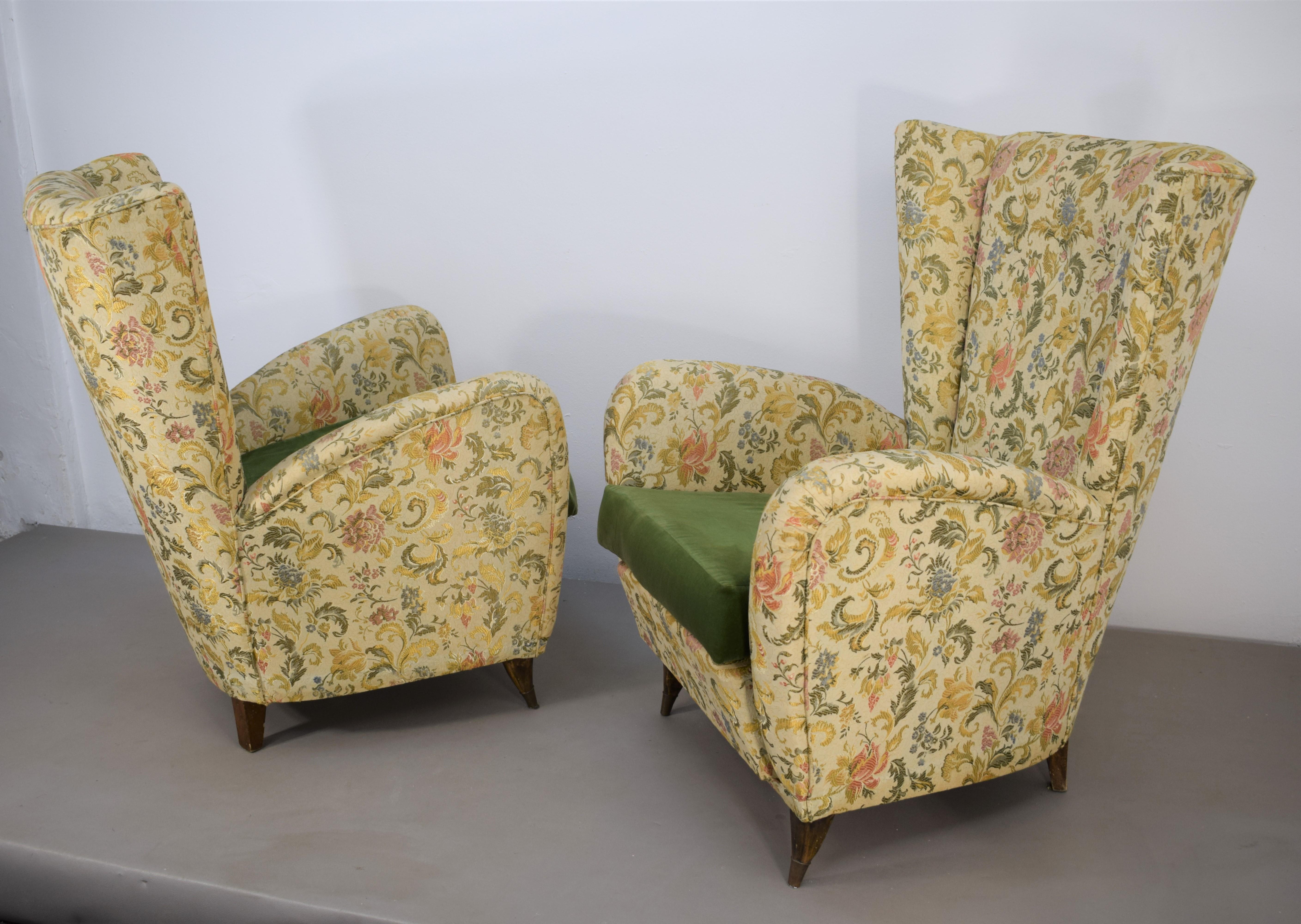 Pair of italian armchairs by Paolo Buffa, 1950s.

Dimensions: H= 94 cm; W= 72 cm; D= 77 cm; H seat= 43 cm.