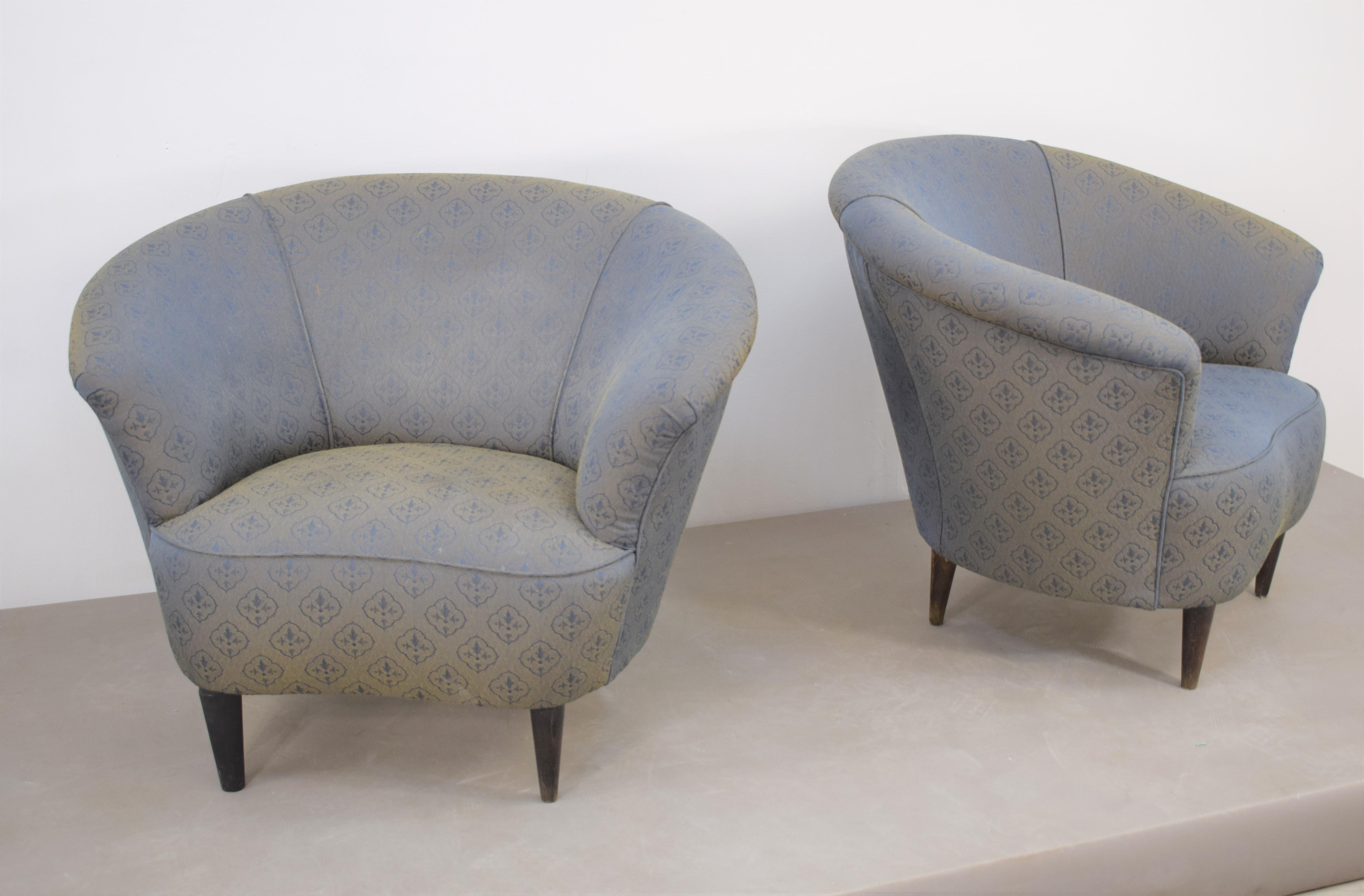 Pair of Italian armchairs, Ico Parisi style, 1950s.
Dimensions: H= 69 cm; W=87 cm; D= 72 cm; height seat= 35 cm.