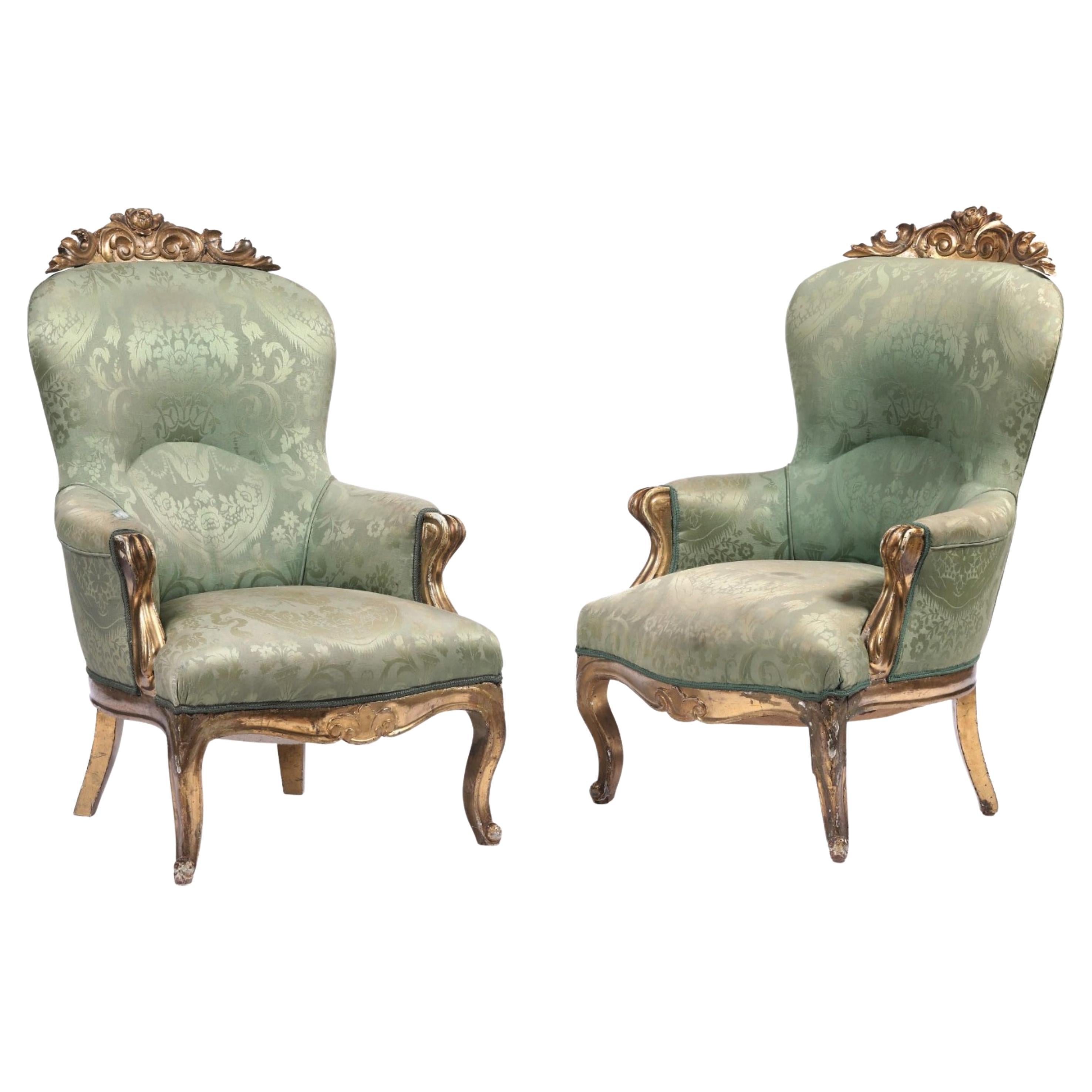 Paar italienische Sessel aus geschnitztem und vergoldetem Holz aus dem 19. Jahrhundert