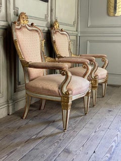 Pair of Italian Armchairs in Sculpted Giltwood