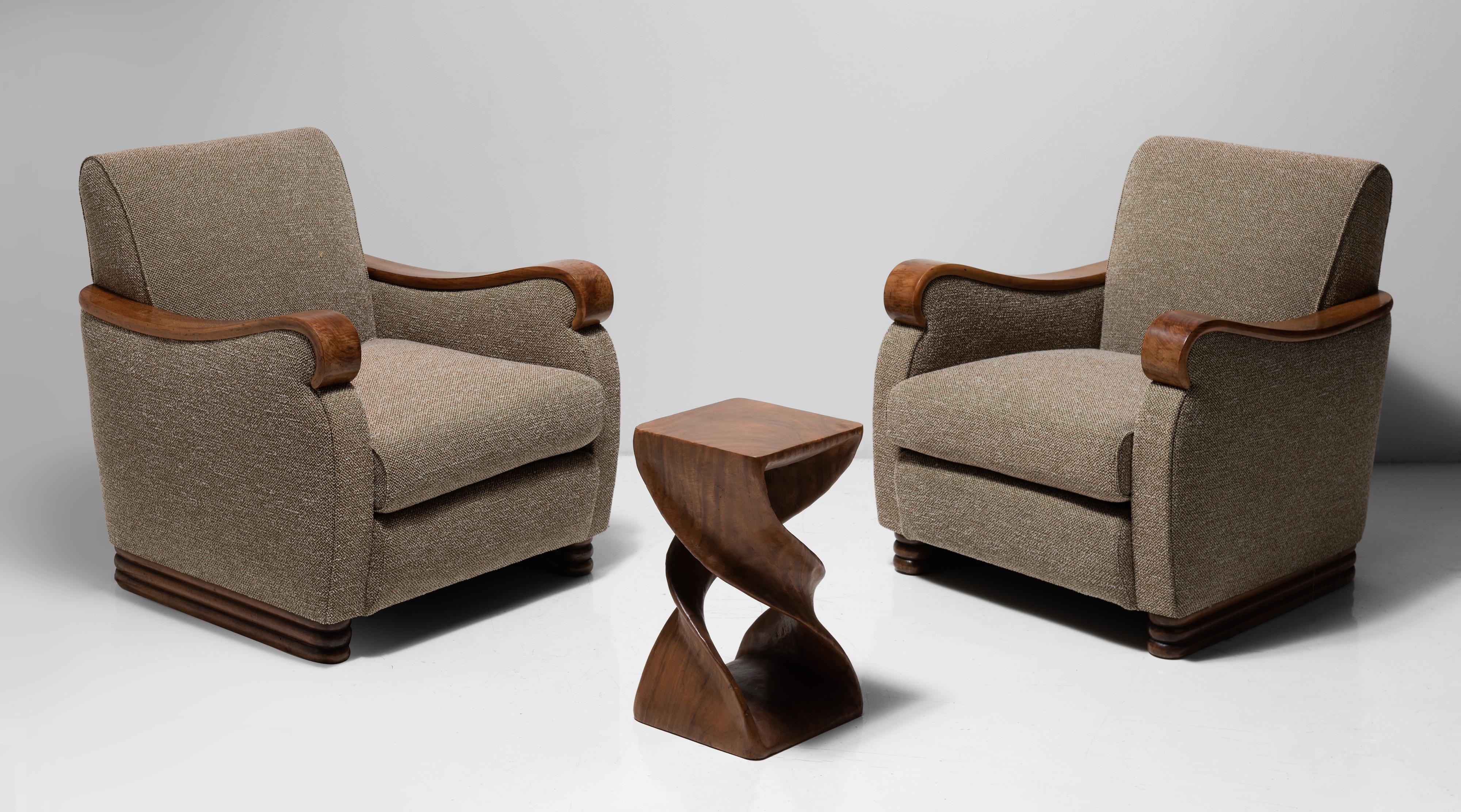Pair of Italian armchairs, Italy, circa 1950.

Newly reupholstered in Maharam wool fabric, with carved wooden armrests and base.
 