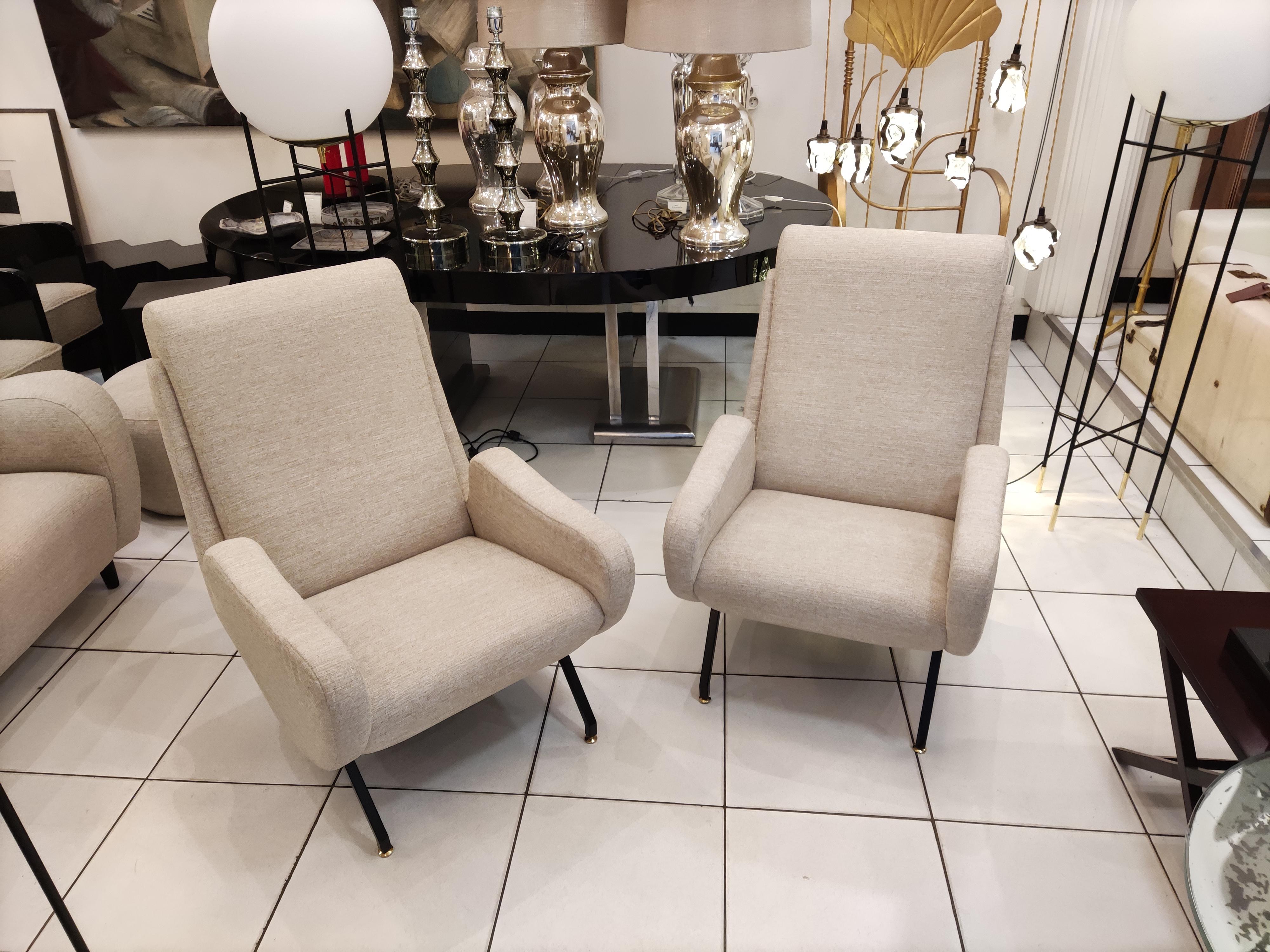 Pair of Italian armchairs with black metal feet, beige fabric (reupholstered).

 