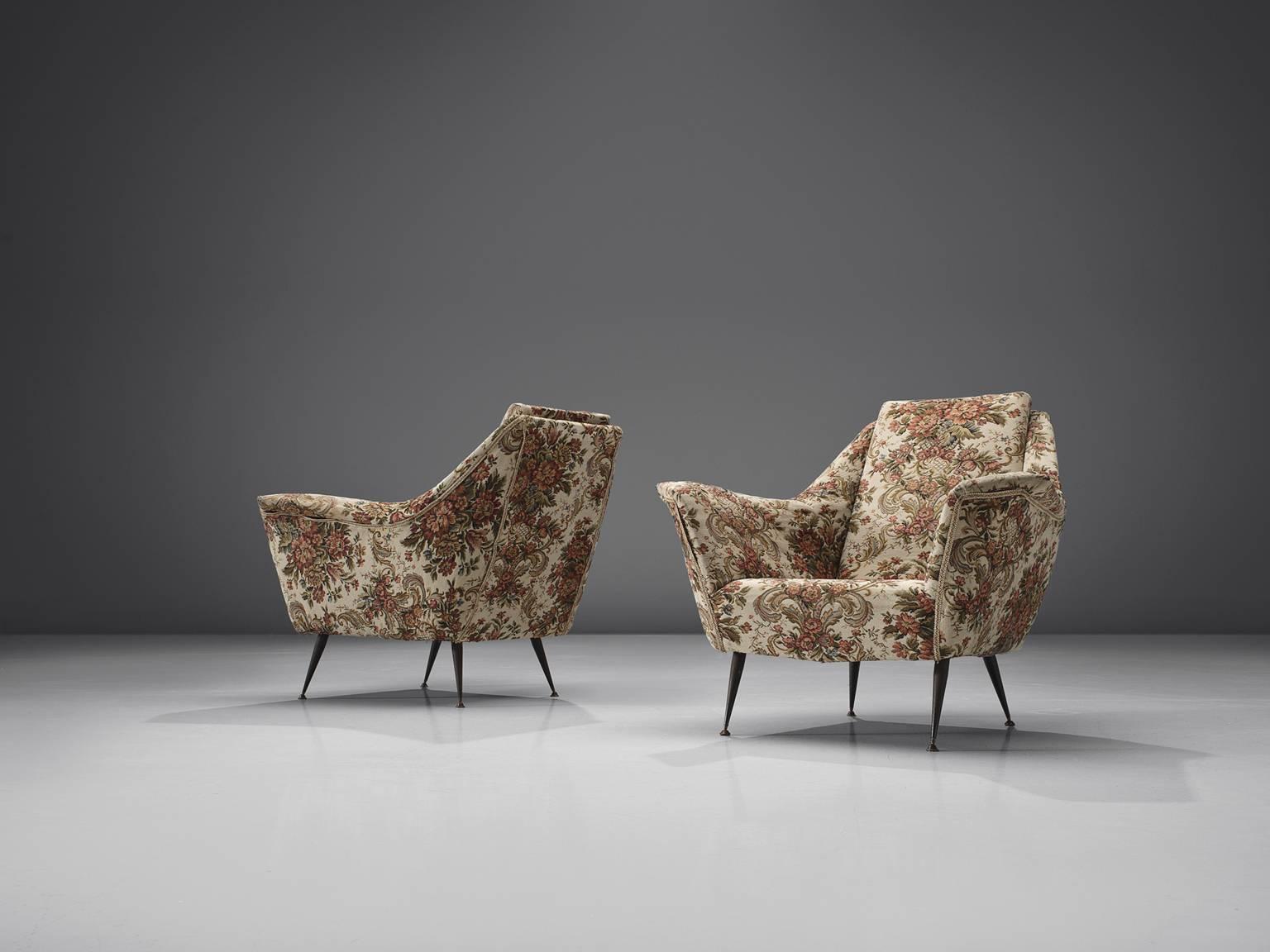 Italian set of lounge chairs, floral fabric, metal legs, brass feet, Italy, 1950s.

This set of chairs is an iconic example of Italian design from the 1950s. The design is on the one hand simplistic, with elegant, subtle lines. On the other hand