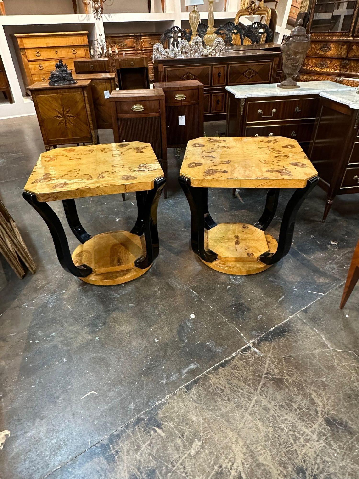Great pair of Italian Art Deco style burl wood and black lacquered side tables. circa 1960. A favorite of top designers!