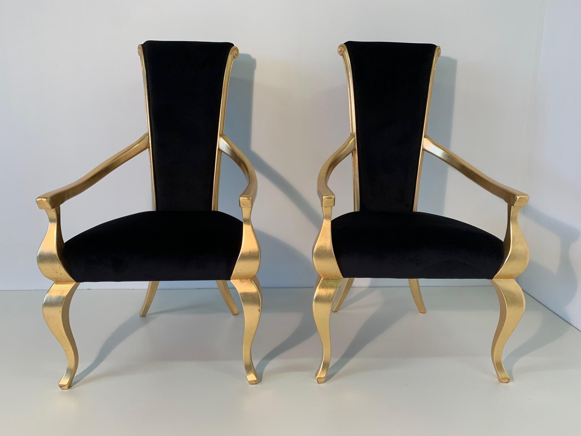 Elegant and important chairs with armrests made in Italy in the 1980s.
The structure is in gold leaf while the upholstery is in fine black velvet.
Both chairs have recently been completely restored.