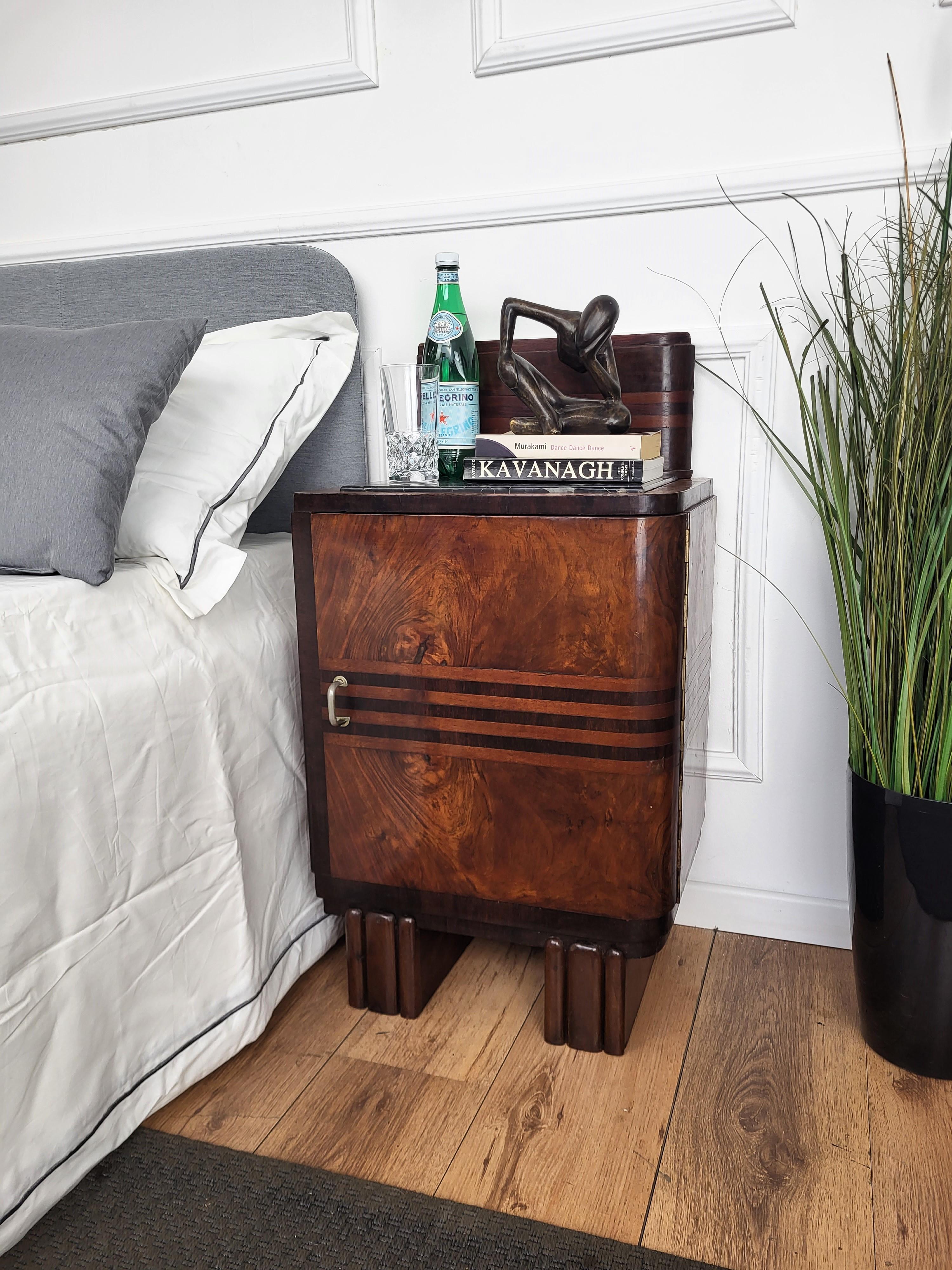 Very elegant and refined pair of Italian 1940s Art Deco bedside tables with great design shape and decors in veneer burl walnut briar wood, front door and internal drawer with black marble top. This night stands make a great look in any style
