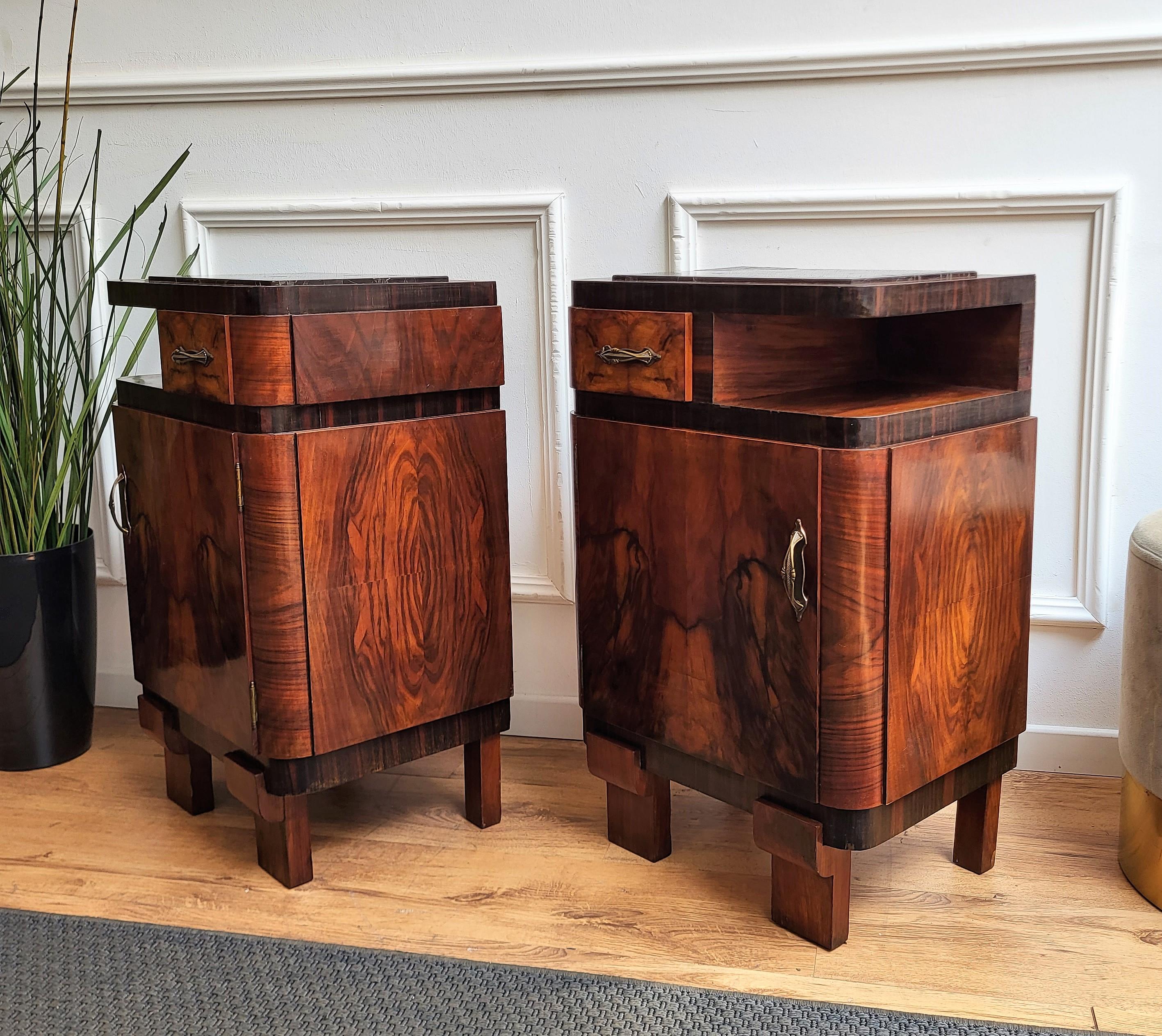 Very elegant and refined pair of Italian 1940s Art Deco bedside tables with great design shape and decors in veneer burl walnut briar wood and front drawer and door with black Portoro marble top. Portoro is a high-quality black marble, where the