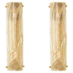 Coppia di lampade da parete in vetro di Murano ambrato in stile Art Deco italiano