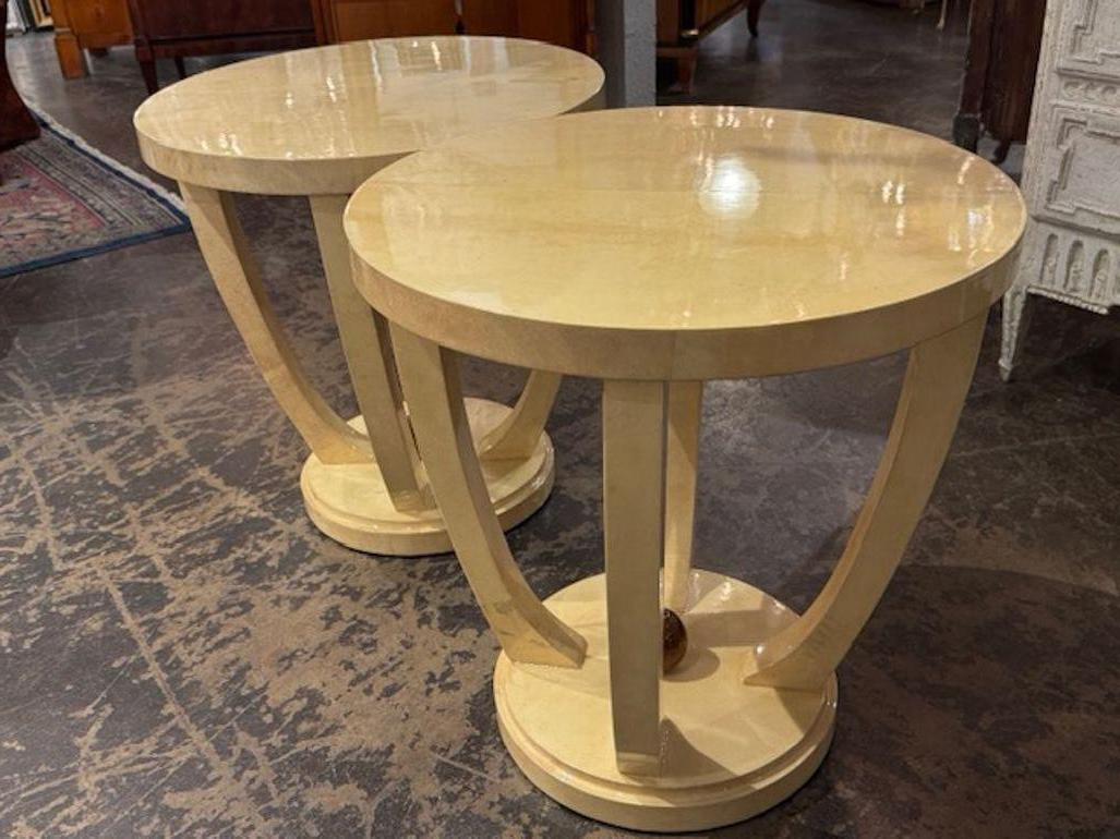 This product is a pair of Italian Art Deco style creme colored lacquered parchment tables. The tables are very unique , and add adding a touch of elegance to any room.  Adds a stylish look, perfect for adding a touch of sophistication to any home
