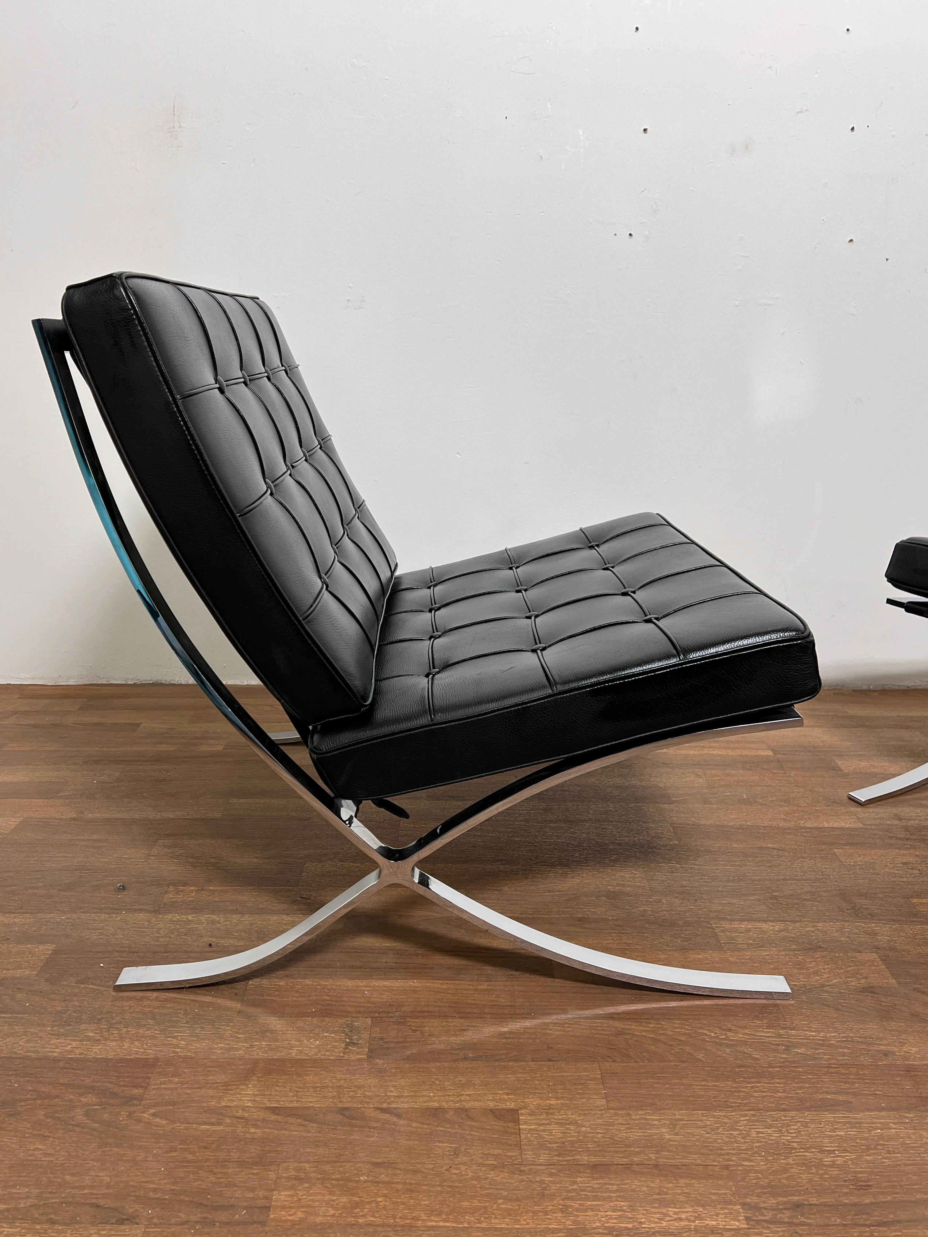 Pair of high quality reproduction Mies Van der Rohe Barcelona style chairs in leather and chrome, made in Italy for Gordon International, ca. 1990s.