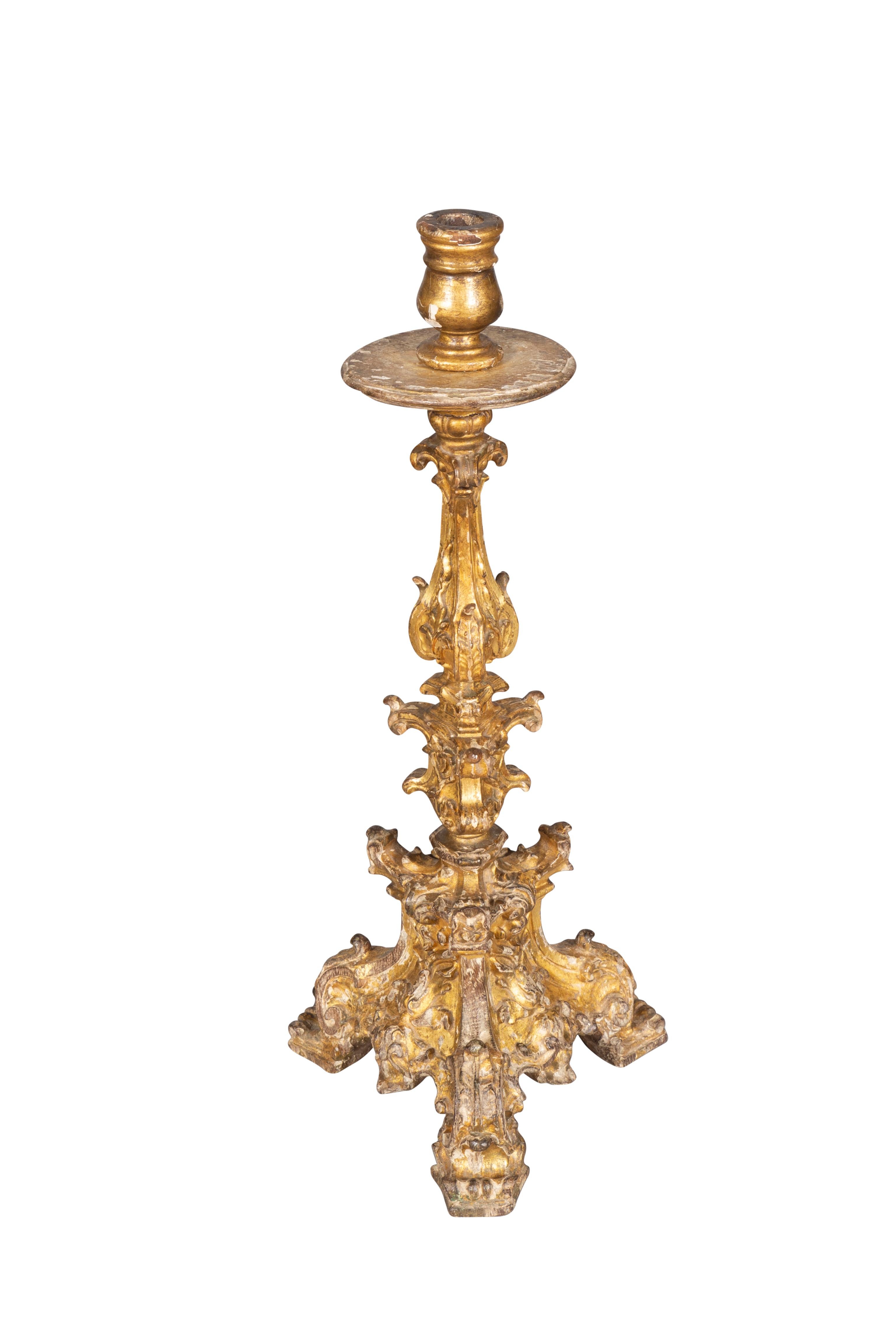 Well carved with baroque scrolls ,triangular base. 