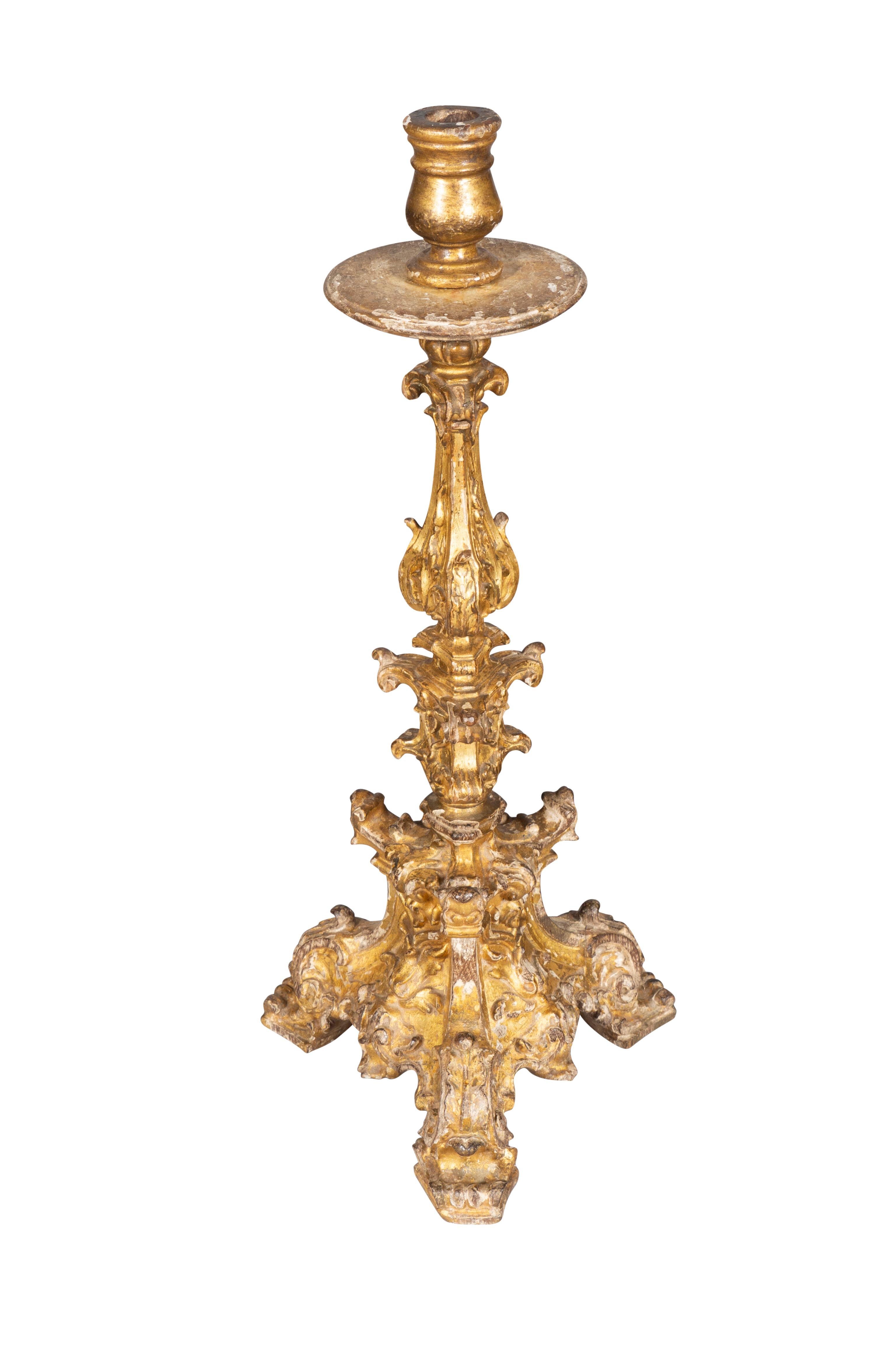 Early 18th Century Pair Of Italian Baroque Giltwood Candlesticks For Sale