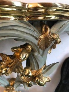 Pair of Italian Baroque Polychrome and Partly Gilded Wall Console