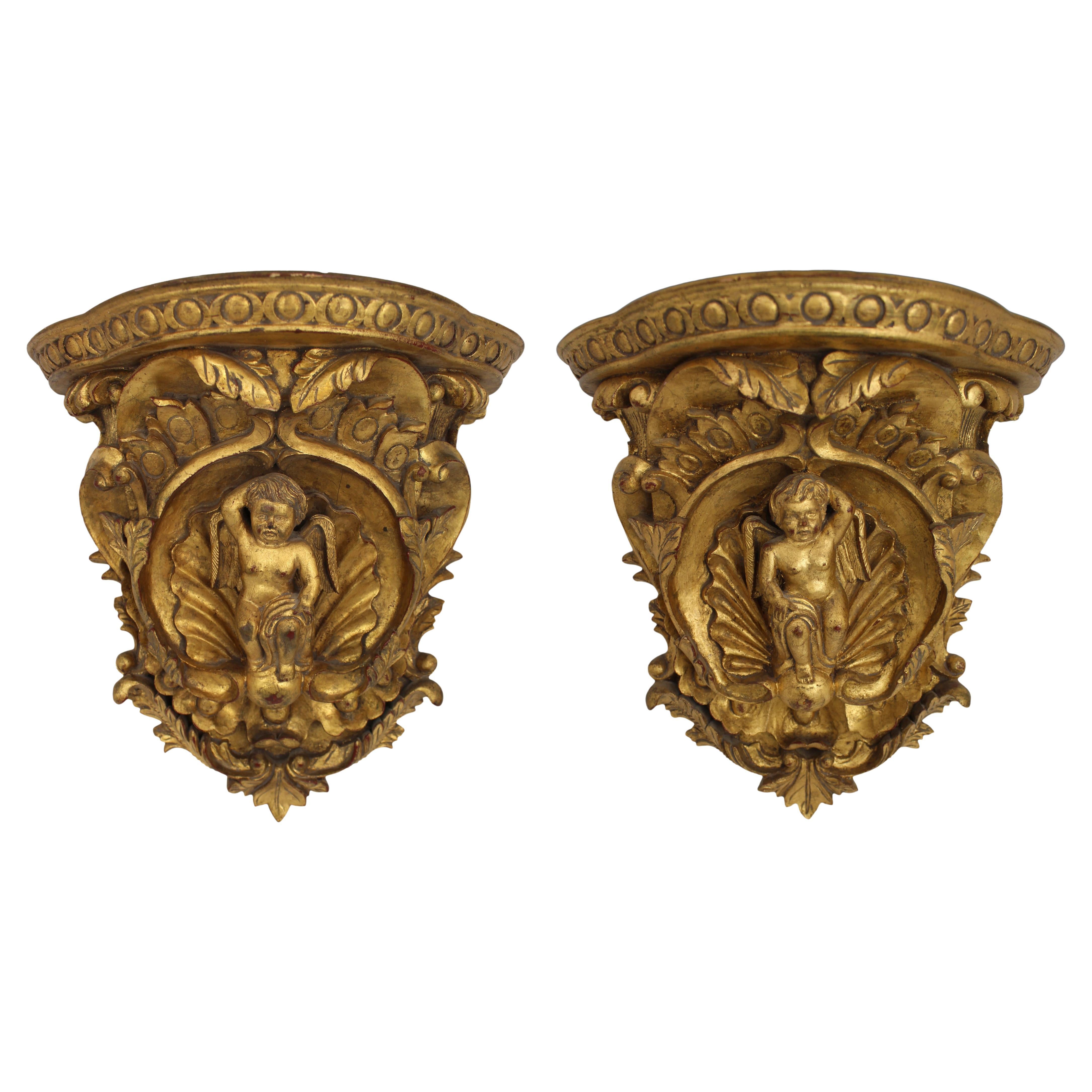 Pair of Italian Baroque Revival Giltwood Wall Brackets with Cherub Motifs