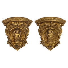 Pair of Italian Baroque Revival Giltwood Wall Brackets with Cherub Motifs