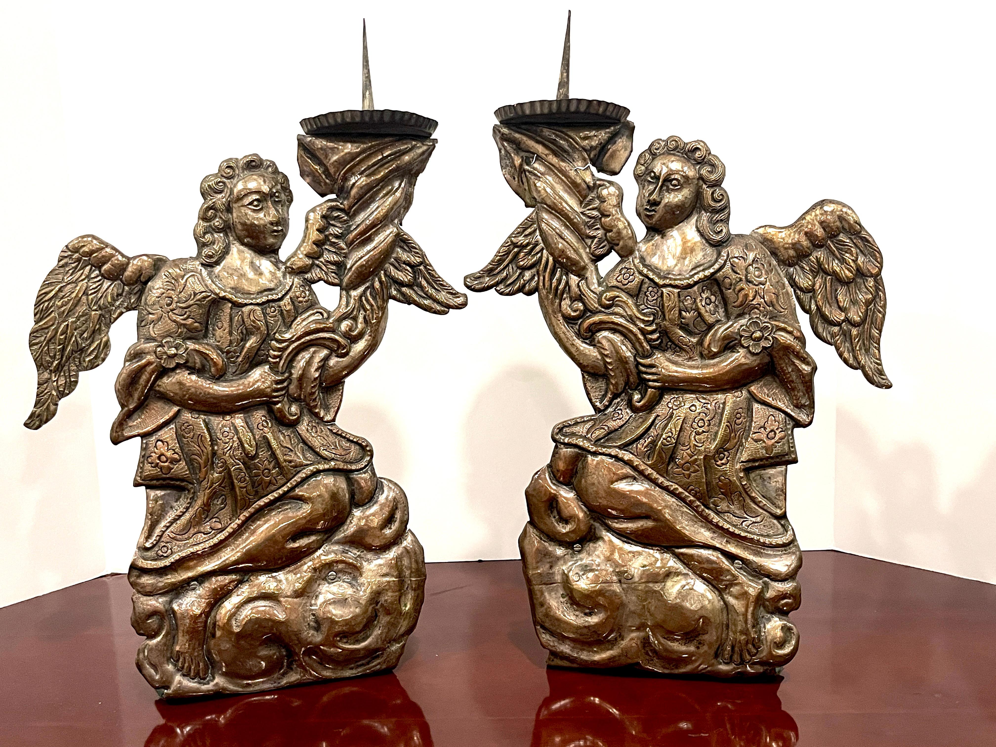 Pair of Italian Baroque Silverplated Angel Candlesticks/Prickets's 
Italy, 17th or 18th century

For sale are a pair of Italian Baroque silverplated angel candlesticks or prickets, dating back to the 17th and 18th centuries, embodying the grandeur