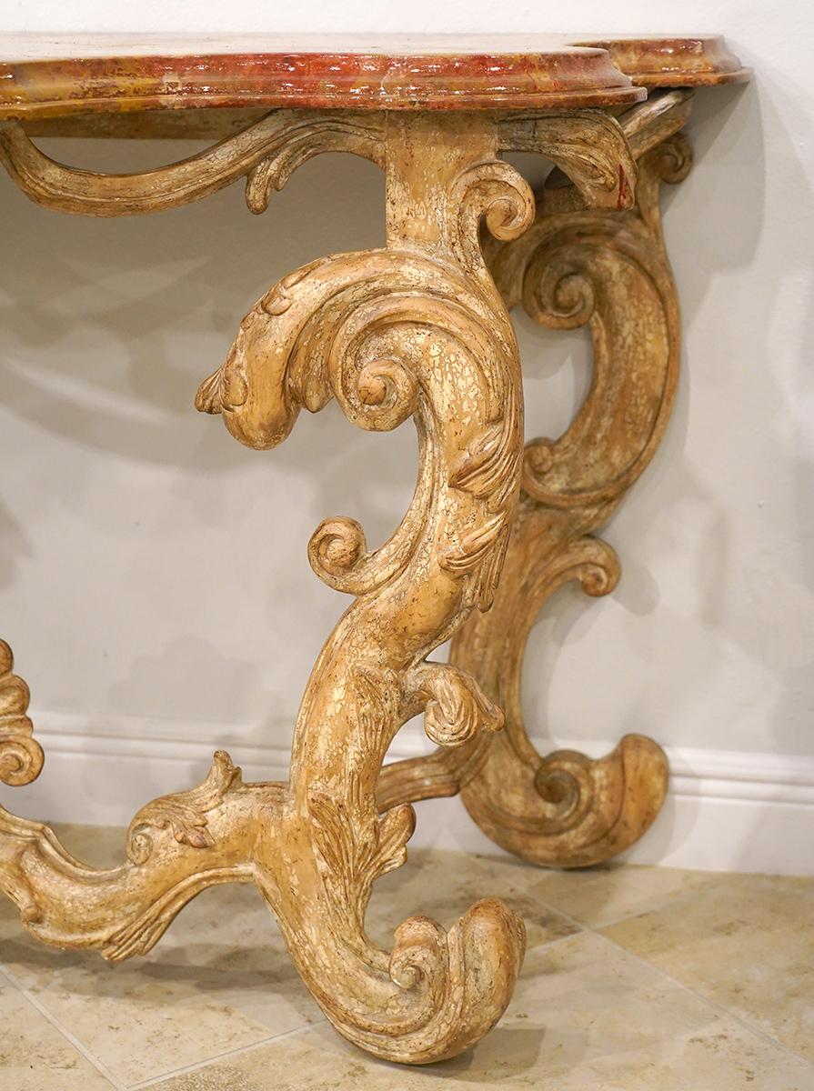 Pair of Italian Baroque Style Carved Console Tables with Marbleized Tops In Good Condition In Ft. Lauderdale, FL