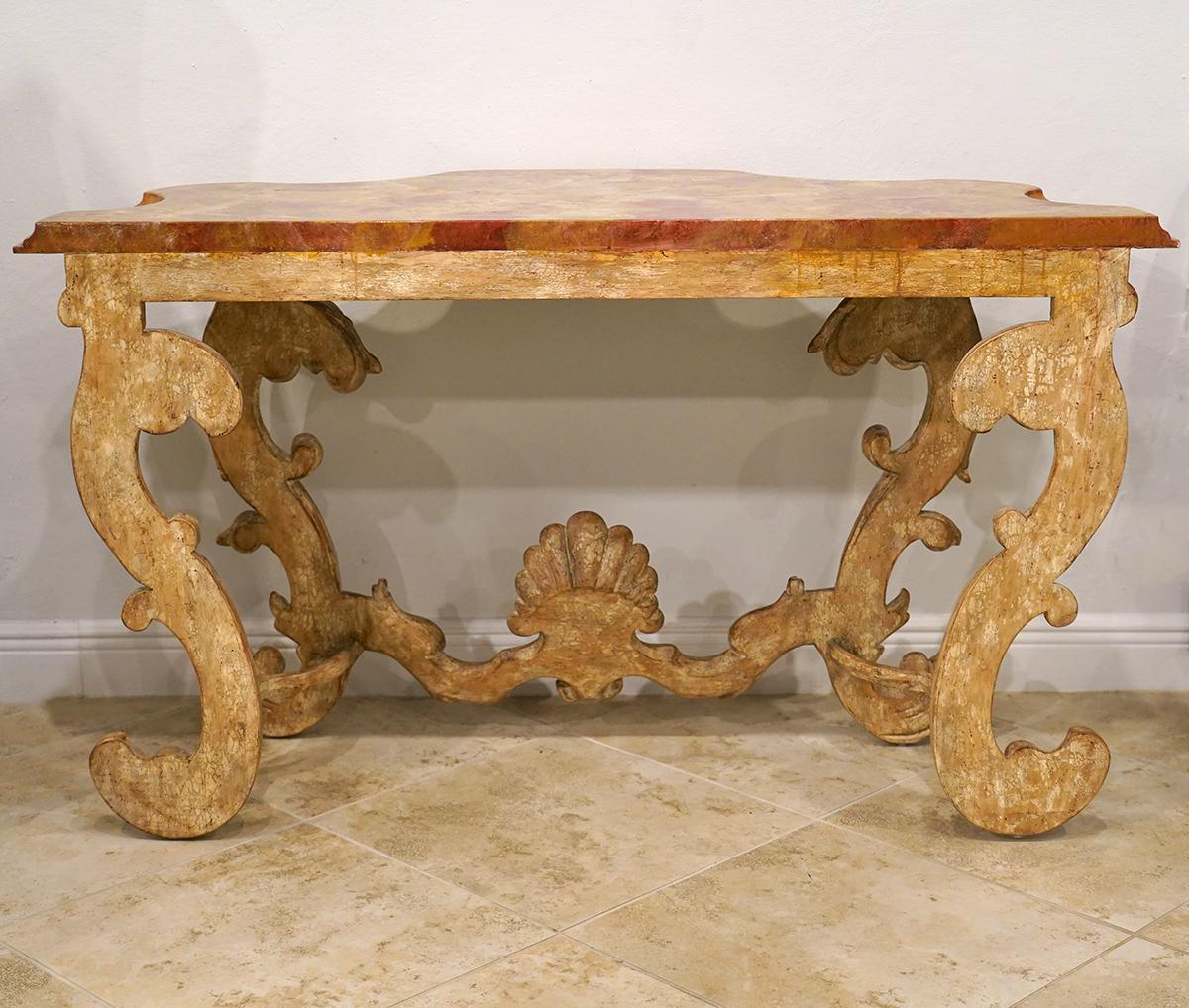 20th Century Pair of Italian Baroque Style Carved Console Tables with Marbleized Tops