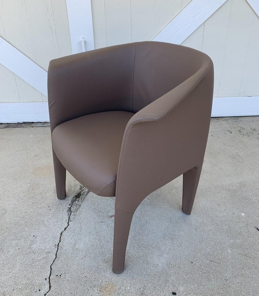 Beautiful armchair designed and manufactured in Italy but no labels are found.
Upholstestered in faux Leather.
The chairs are in excellent condition.

Measurements:
30.50 inches high x 24 inches deep x 27.75 inches wide x 18 inches seat height.