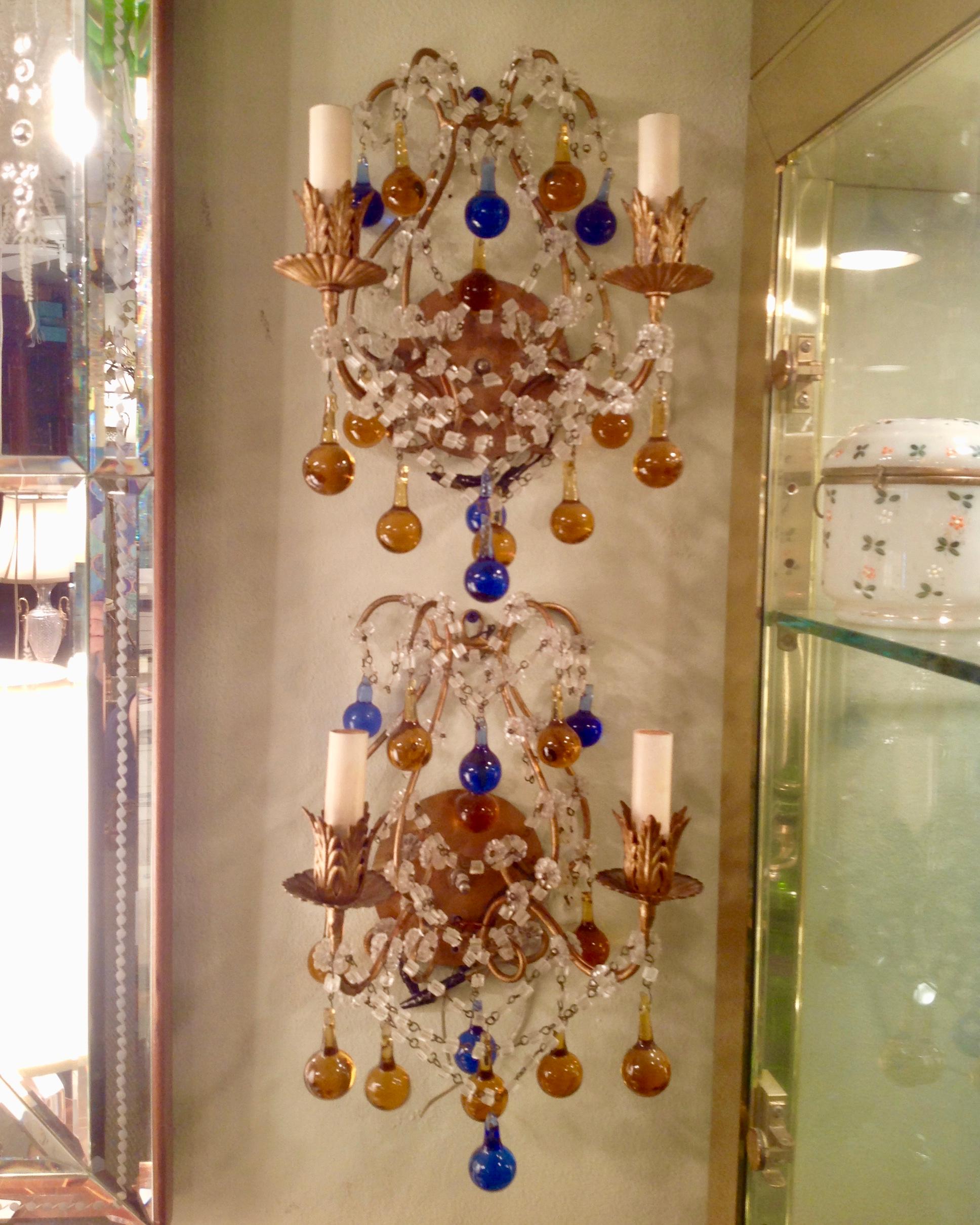 Rich royal blue and amber colors. A dramatic and colorful pair of Italian sconces.
A stunningly beautiful and dramatic pair - electrified. Nicely scaled.