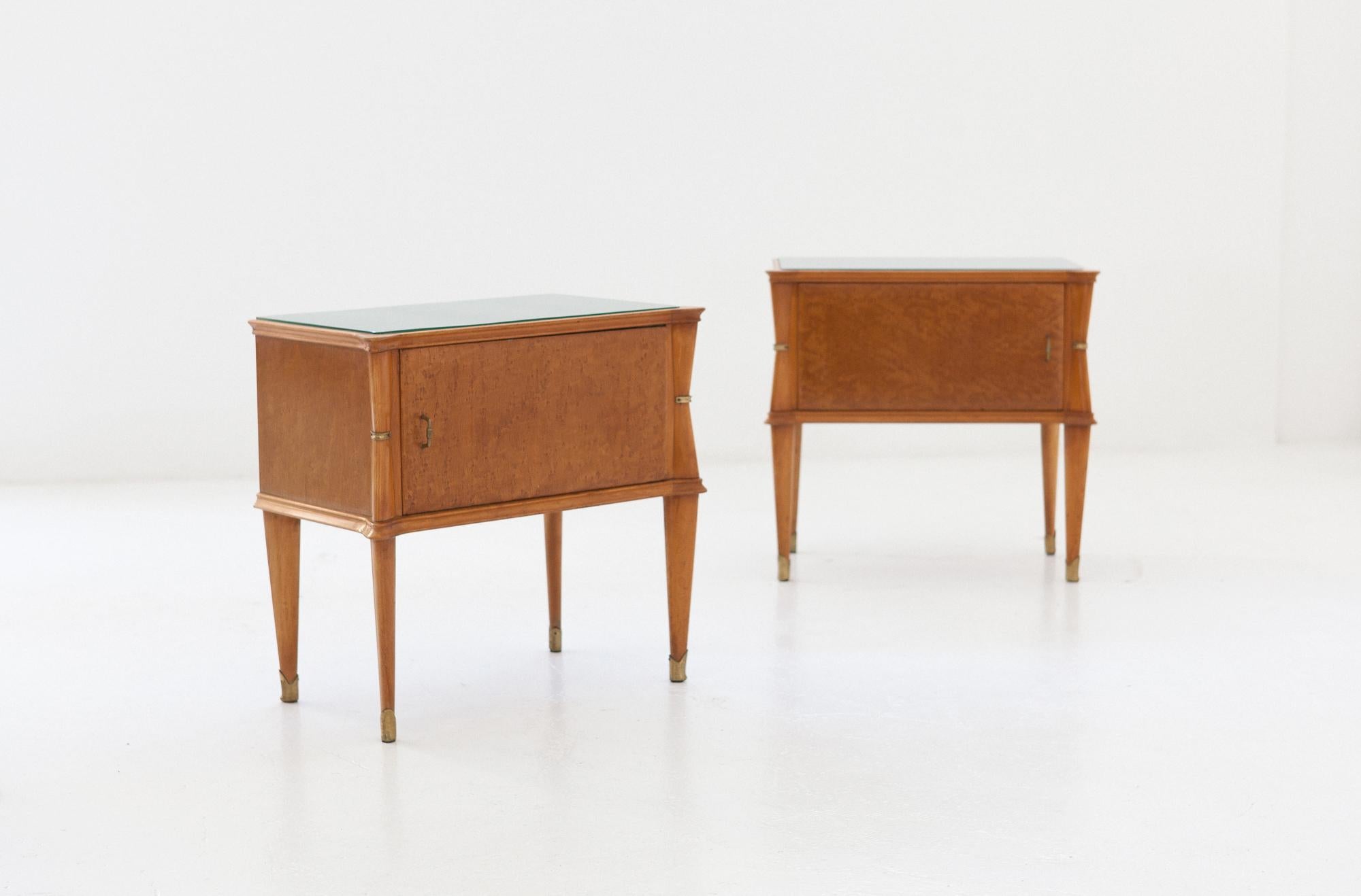 Set of two nightstands, manufactured in Italy in 1950s
These two side tables has made of beech wood and glass top.

This is a Mid-Century Modern style items.

Very good shape, only light and pleasant signs of aging remain visible.

  