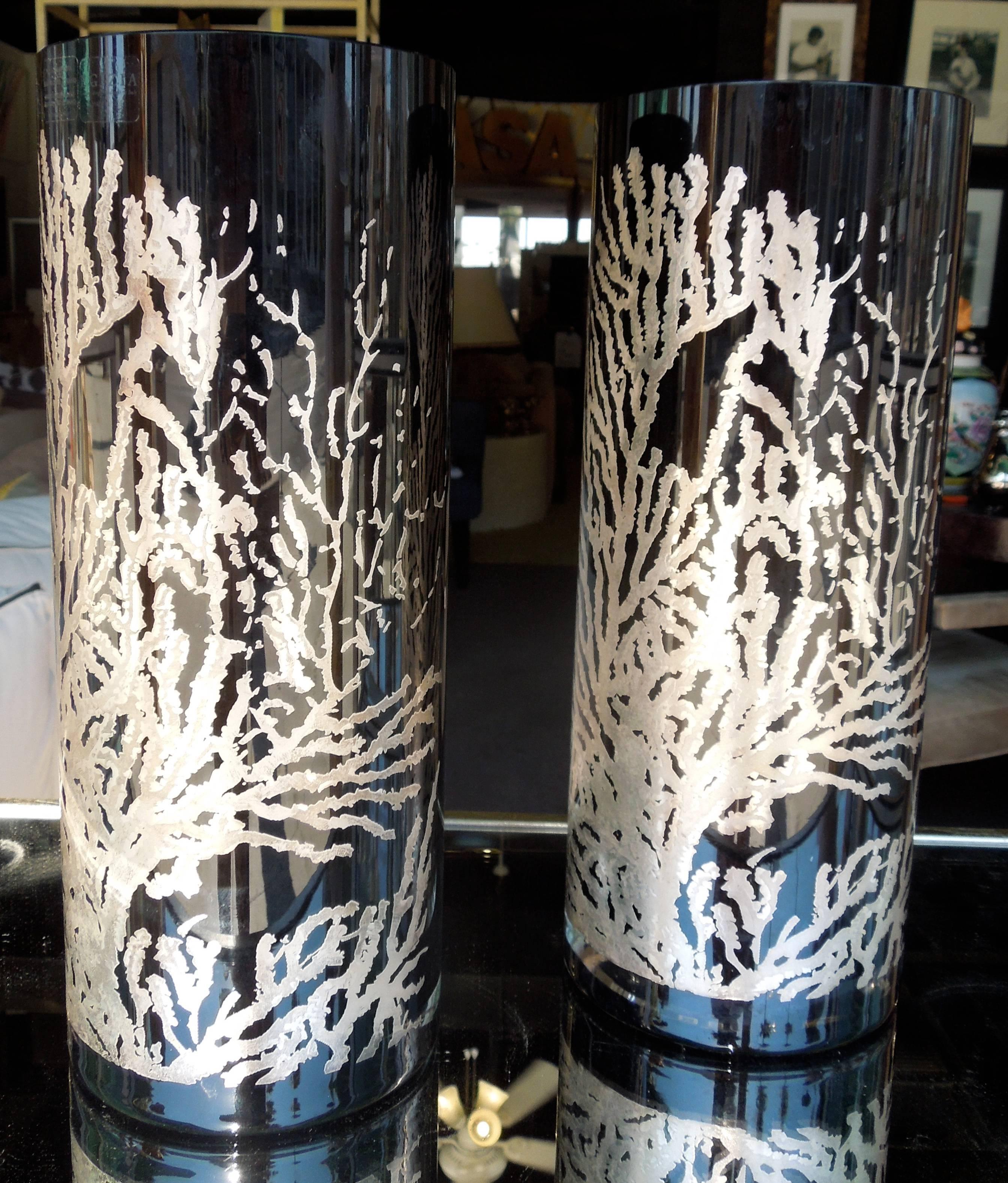 As new from Palm Springs Collector's Display cabinet. These matching pair of modern Italian glass are a work of art! Handmade in Italy by Egizia, this dimensional silver coral art piece were designed by Ninchi & Locatelli. On shiny black glass the