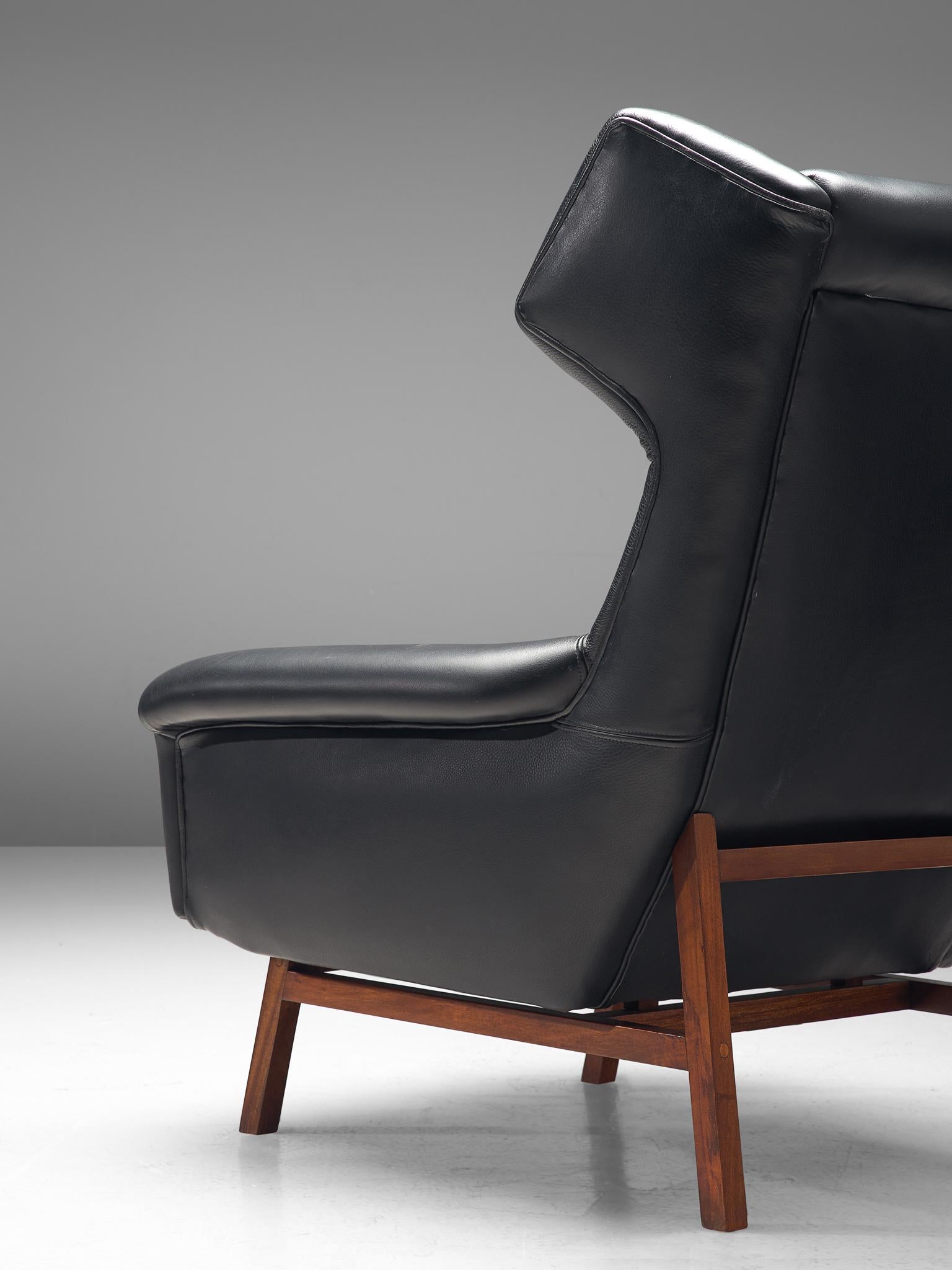 Mid-20th Century Pair of Italian Black Leather Wingback Chairs