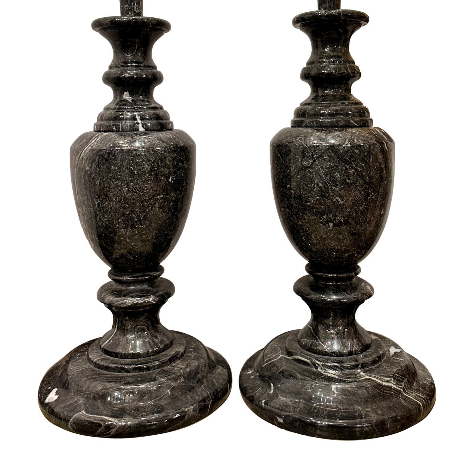 Pair of circa 1920’s Italian gray, black and white baluster shaped marble table lamps with double light cluster.

Measurements:
Height of Body: 23″
Height to Shade Rest: 33″

  