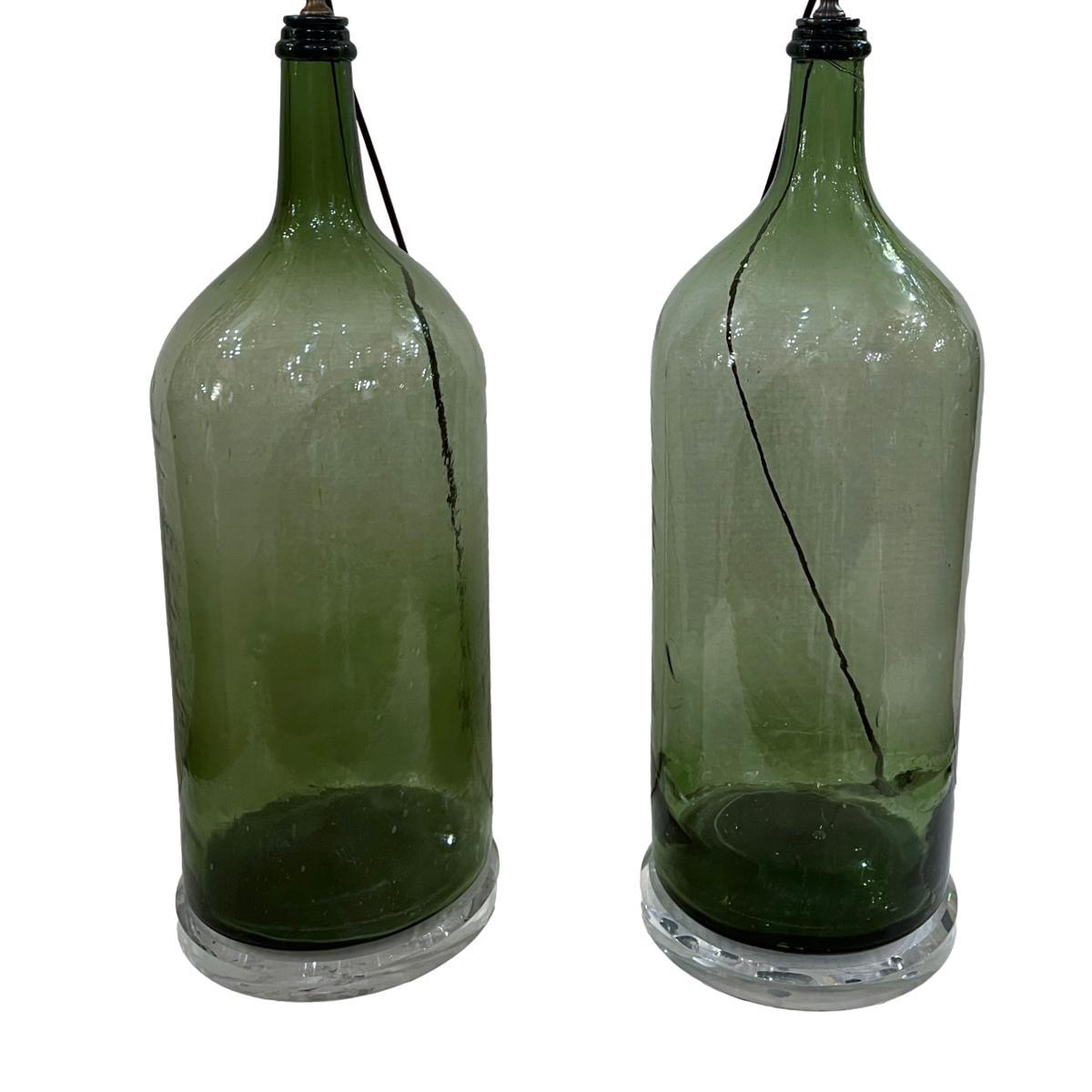 Pair of large circa 1920's Italian bottle lamps.

Measurements:
Height of body: 25.5