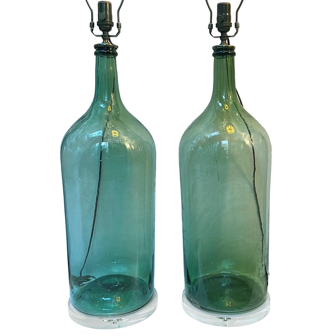 Pair of circa 1920's Italian bottle lamps.

Measurements:
Height of body: 26