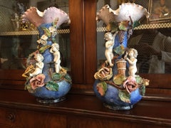 Pair of Italian Blue Vases with Belle Époque Barbotine Putti and Flowers