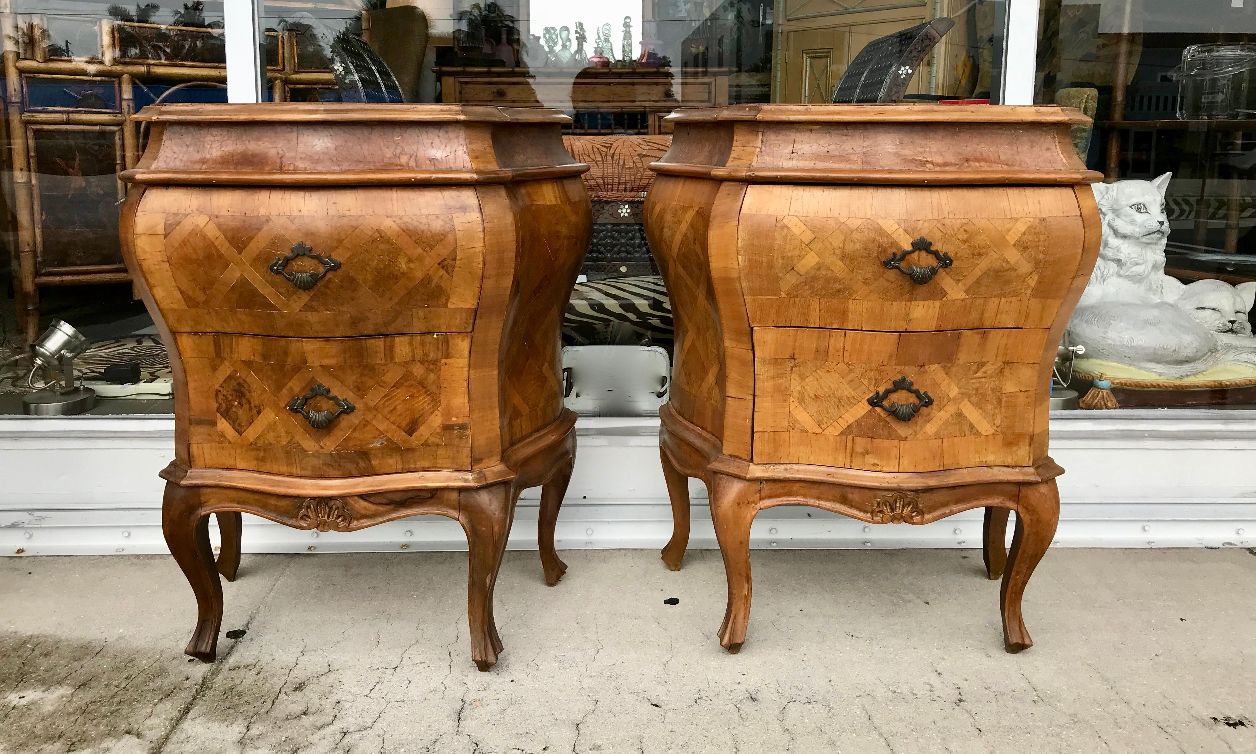The stunning chests are finished on all 4 sides with outstanding parquetry inlays.
The may be used as night stands as well. They are designed with 2 drawers.
They are outfitted with glass tops.